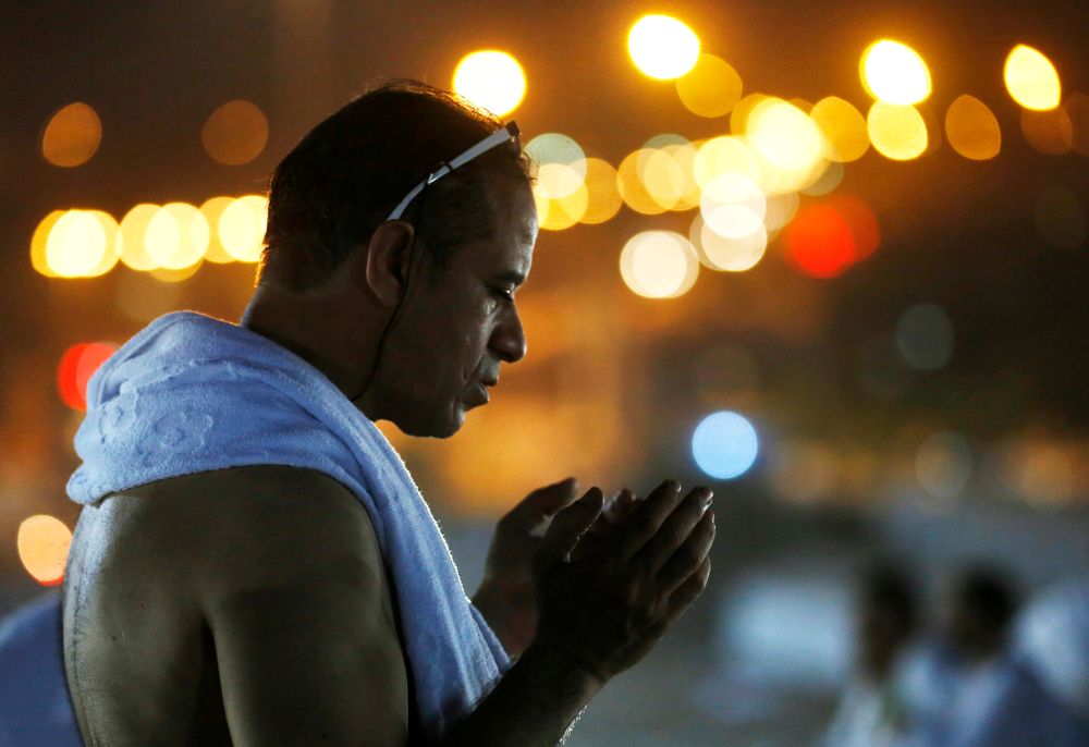 A Muslim pilgrim prays on a rocky hill known as Mountain of Mercy, on the Plain of Arafat, during the annual hajj pilgrimage, near the holy city of Mecca, Saudi Arabia, Saturday, Aug. 10, 2019. More than 2 million pilgrims were gathered to perform initial rites of the hajj, an Islamic pilgrimage that takes the faithful along a path traversed by the Prophet Muhammad some 1,400 years ago. (AP Photo/Amr Nabil) A Muslim pilgrim prays on a rocky hill known as Mountain of Mercy, on the Plain of Arafat, during the annual hajj pilgrimage, near the holy city of Mecca, Saudi Arabia, Saturday, Aug. 10, 2019. More than 2 million pilgrims were gathered to perform initial rites of the hajj, an Islamic pilgrimage that takes the faithful along a path traversed by the Prophet Muhammad some 1,400 years ago. (AP Photo/Amr Nabil)
