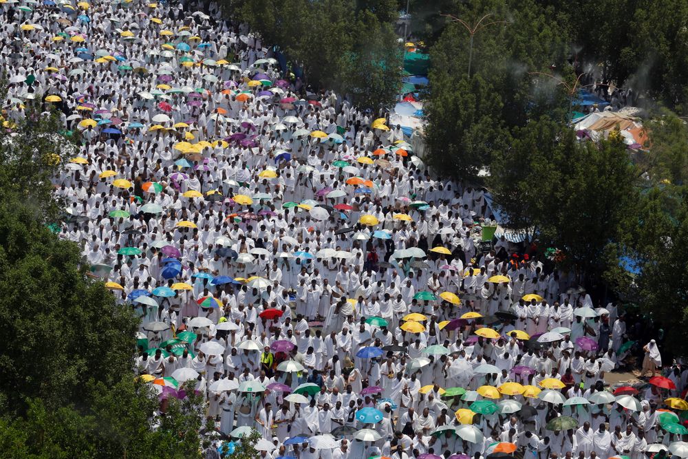 Hundreds of thousands of Muslim pilgrims pray outside Namira Mosque in Arafat during the annual hajj pilgrimage, near the holy city of Mecca, Saudi Arabia, Saturday, Aug. 10, 2019. More than 2 million pilgrims were gathered to perform initial rites of the hajj, an Islamic pilgrimage that takes the faithful along a path traversed by the Prophet Muhammad some 1,400 years ago. (AP Photo/Amr Nabil) Hundreds of thousands of Muslim pilgrims pray outside Namira Mosque in Arafat during the annual hajj pilgrimage, near the holy city of Mecca, Saudi Arabia, Saturday, Aug. 10, 2019. More than 2 million pilgrims were gathered to perform initial rites of the hajj, an Islamic pilgrimage that takes the faithful along a path traversed by the Prophet Muhammad some 1,400 years ago. (AP Photo/Amr Nabil)