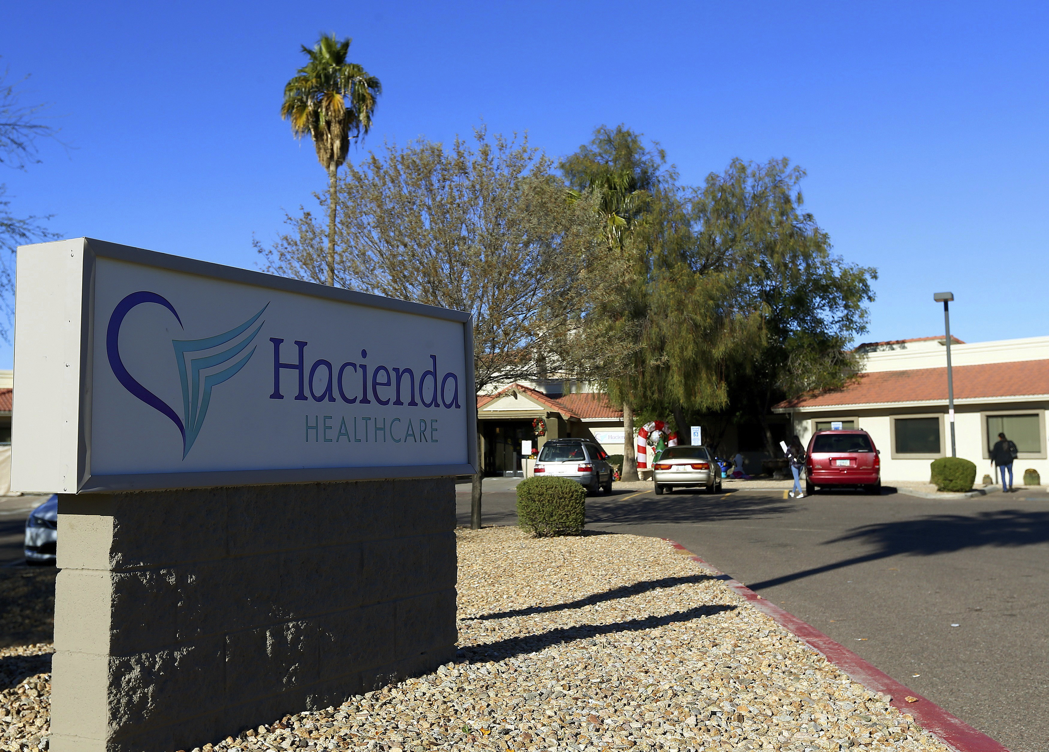 This Friday, Jan. 4, 2019, photo shows Hacienda HealthCare in Phoenix. The revelation that a Phoenix woman in a vegetative state recently gave birth has prompted Hacienda HealthCare CEO Bill Timmons to resign, putting a spotlight on the safety of long-term care settings for patients who are severely disabled or incapacitated. (AP Photo/Ross D. Franklin) This Friday, Jan. 4, 2019, photo shows Hacienda HealthCare in Phoenix. The revelation that a Phoenix woman in a vegetative state recently gave birth has prompted Hacienda HealthCare CEO Bill Timmons to resign, putting a spotlight on the safety of long-term care settings for patients who are severely disabled or incapacitated. (AP Photo/Ross D. Franklin)