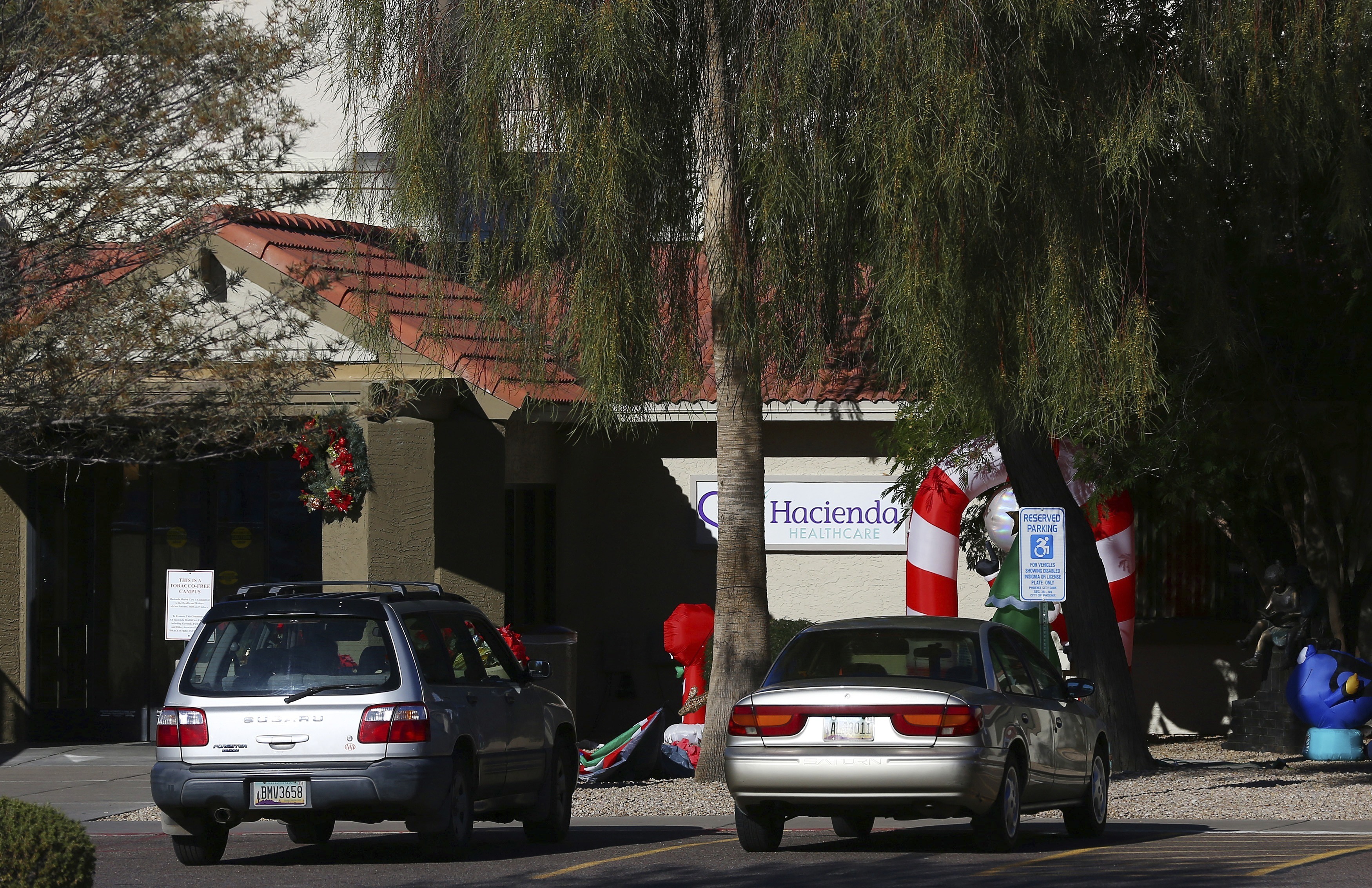 This Friday, Jan. 4, 2019, photo shows Hacienda HealthCare in Phoenix. The revelation that a Phoenix woman in a vegetative state recently gave birth has prompted Hacienda HealthCare CEO Bill Timmons to resign, putting a spotlight on the safety of long-term care settings for patients who are severely disabled or incapacitated. (AP Photo/Ross D. Franklin) This Friday, Jan. 4, 2019, photo shows Hacienda HealthCare in Phoenix. The revelation that a Phoenix woman in a vegetative state recently gave birth has prompted Hacienda HealthCare CEO Bill Timmons to resign, putting a spotlight on the safety of long-term care settings for patients who are severely disabled or incapacitated. (AP Photo/Ross D. Franklin)