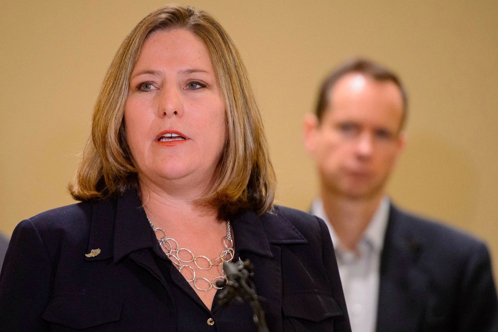 Jill McCluskey speaks at a news conference in Salt Lake City on Monday, Nov. 25, 2019. Jill and Matthew McCluskey, back right, parents of Lauren McCluskey, a University of Utah student and track athlete who was fatally shot on campus, are fighting a claim by the college that their lawsuit should be dismissed because their daughter’s killer wasn’t a student. (Trent Nelson/The Salt Lake Tribune via AP) Jill McCluskey speaks at a news conference in Salt Lake City on Monday, Nov. 25, 2019. Jill and Matthew McCluskey, back right, parents of Lauren McCluskey, a University of Utah student and track athlete who was fatally shot on campus, are fighting a claim by the college that their lawsuit should be dismissed because their daughter’s killer wasn’t a student. (Trent Nelson/The Salt Lake Tribune via AP)