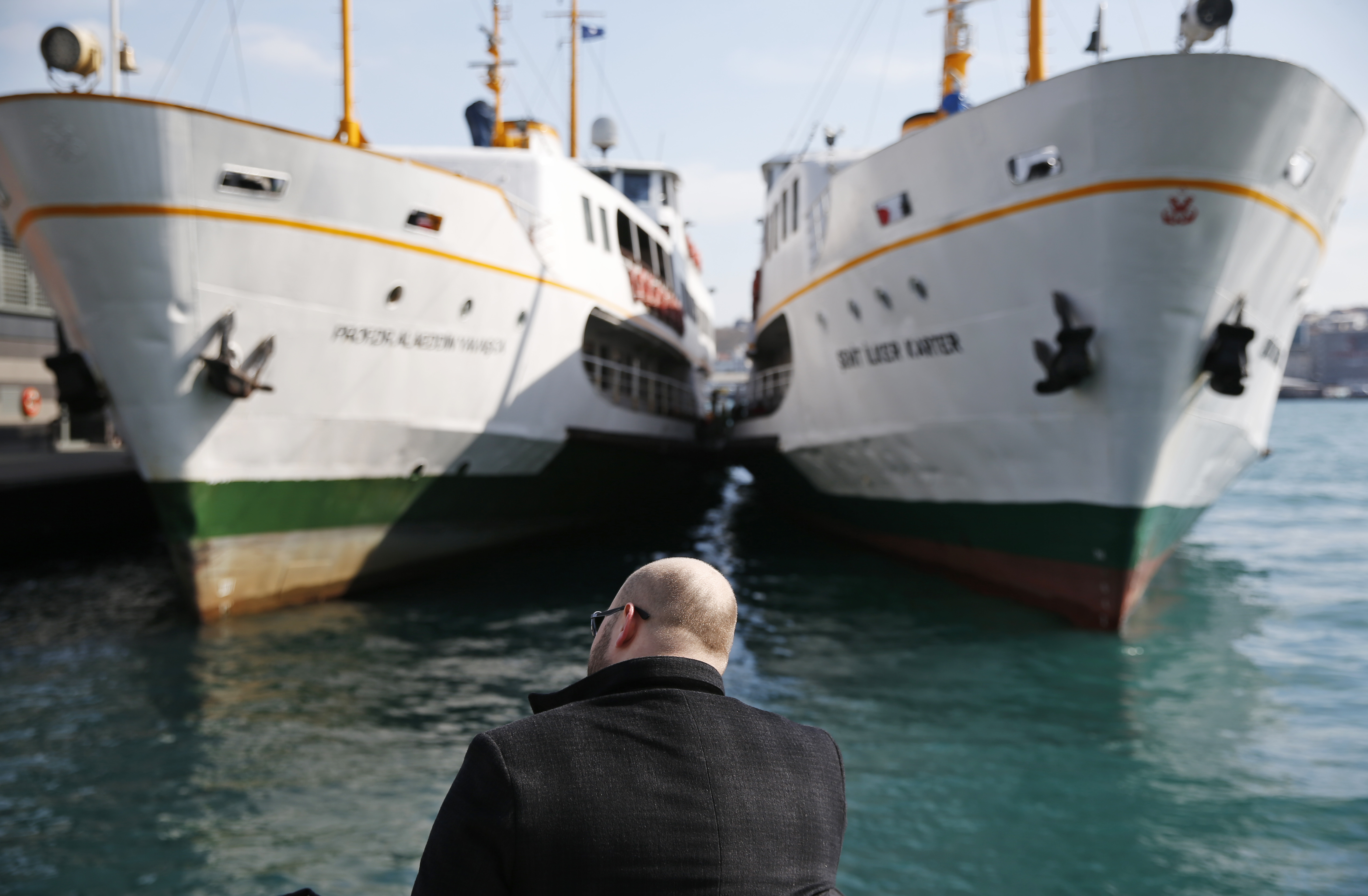 In this Thursday, April 4, 2019 photo, a man sits by the Golden Horn in Istanbul. The mood among opposition supporters in Turkey's biggest city is one of jubilation but also worry - fear that their win in Istanbul's mayoral race could be overturned in a recount taking place after the ruling party challenged the election results. (AP Photo/Lefteris Pitarakis) In this Thursday, April 4, 2019 photo, a man sits by the Golden Horn in Istanbul. The mood among opposition supporters in Turkey's biggest city is one of jubilation but also worry - fear that their win in Istanbul's mayoral race could be overturned in a recount taking place after the ruling party challenged the election results. (AP Photo/Lefteris Pitarakis)