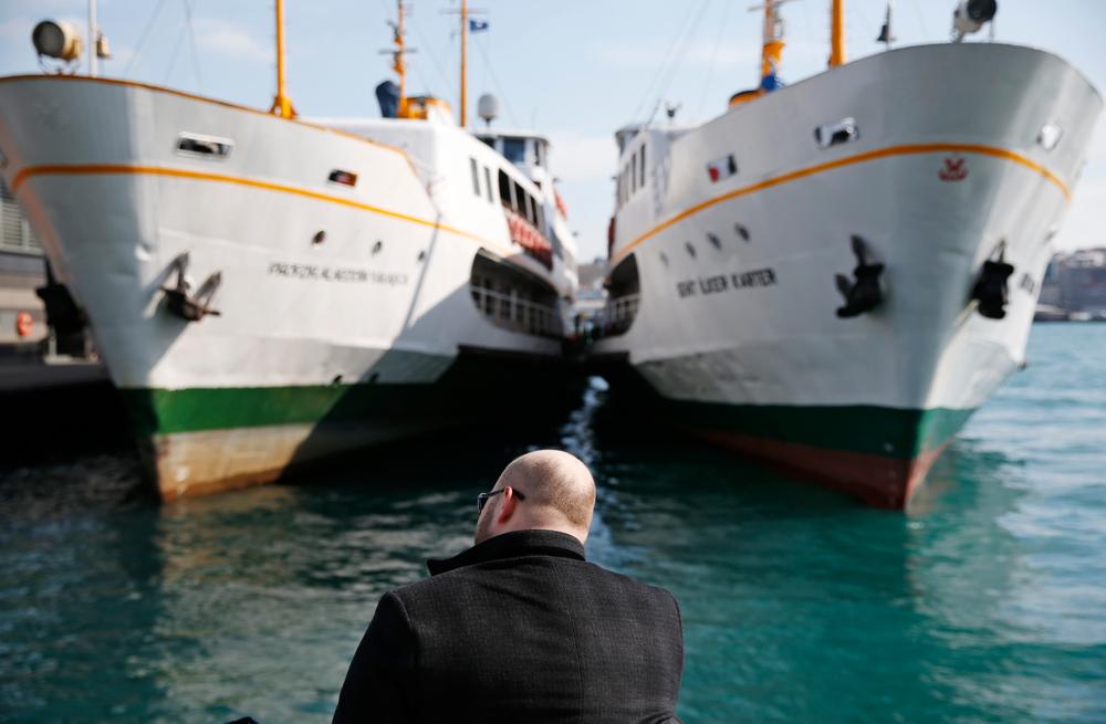 In this Thursday, April 4, 2019 photo, a man sits by the Golden Horn in Istanbul. The mood among opposition supporters in Turkey's biggest city is one of jubilation but also worry - fear that their win in Istanbul's mayoral race could be overturned in a recount taking place after the ruling party challenged the election results. (AP Photo/Lefteris Pitarakis) In this Thursday, April 4, 2019 photo, a man sits by the Golden Horn in Istanbul. The mood among opposition supporters in Turkey's biggest city is one of jubilation but also worry - fear that their win in Istanbul's mayoral race could be overturned in a recount taking place after the ruling party challenged the election results. (AP Photo/Lefteris Pitarakis)