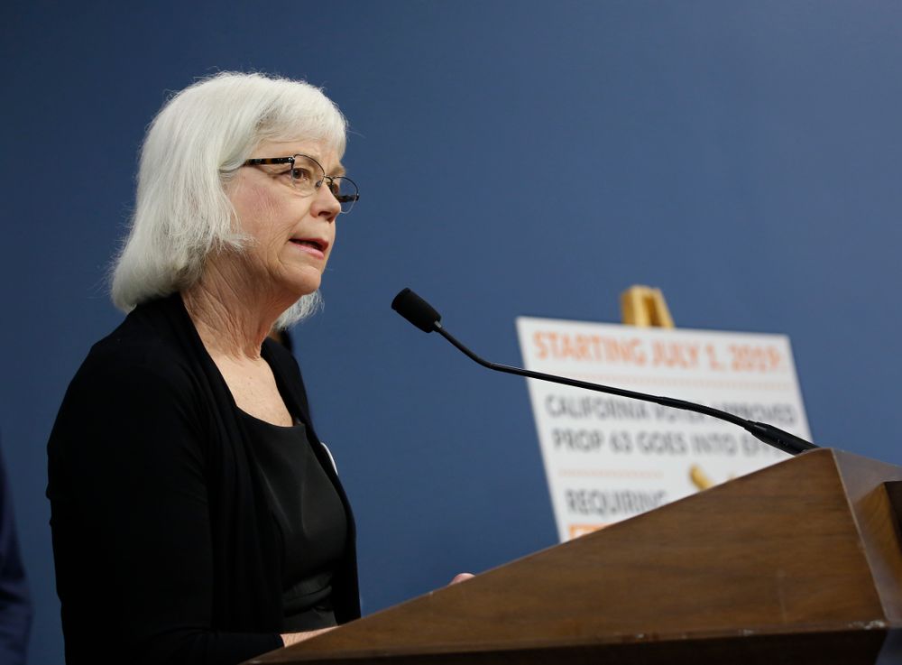 Amanda Wilcox, spokeswoman for the Brady Campaign to Prevent Gun Violence, discusses a 2016 voter-approved ballot initiative that will require Californians to undergo criminal background checks every time they buy ammunition starting July 1 during a news conference in Sacramento, Calif., Tuesday, June 25, 2019. Wilcox said the checks required by the new law are Amanda Wilcox, spokeswoman for the Brady Campaign to Prevent Gun Violence, discusses a 2016 voter-approved ballot initiative that will require Californians to undergo criminal background checks every time they buy ammunition starting July 1 during a news conference in Sacramento, Calif., Tuesday, June 25, 2019. Wilcox said the checks required by the new law are