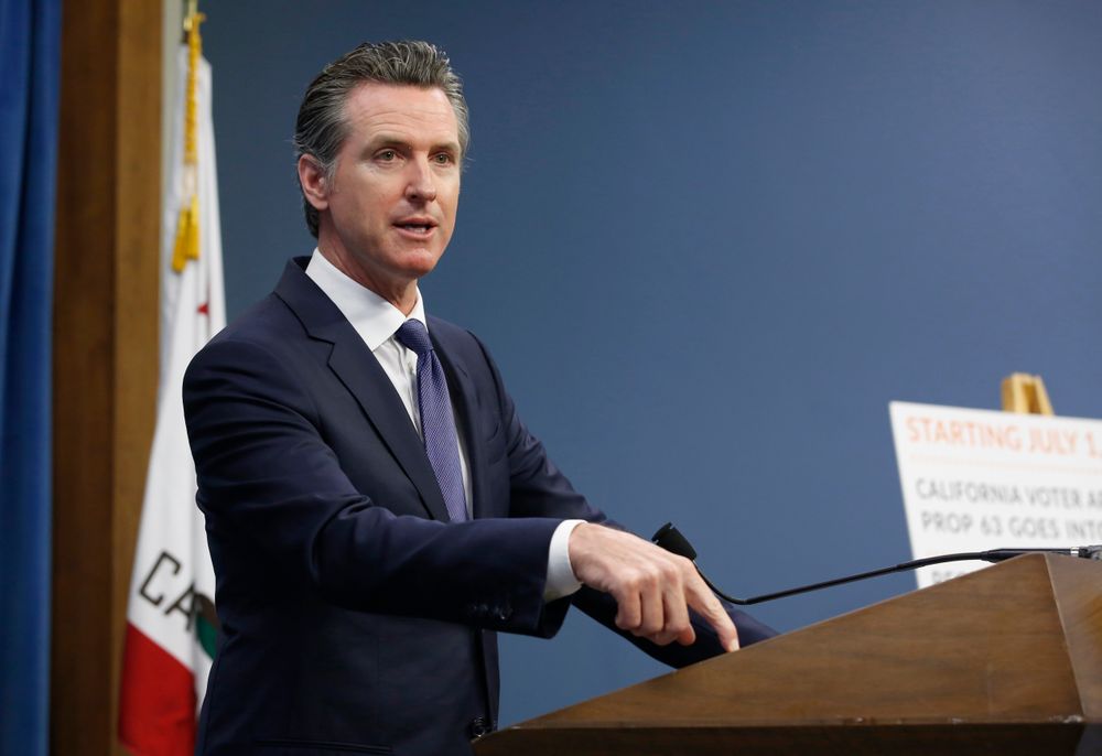 Gov. Gavin Newsom discusses a 2016 voter-approved ballot initiative that will require Californians to undergo criminal background checks every time they buy ammunition starting July 1 during a news conference in Sacramento, Calif., Tuesday June 25, 2019. (AP Photo/Rich Pedroncelli) Gov. Gavin Newsom discusses a 2016 voter-approved ballot initiative that will require Californians to undergo criminal background checks every time they buy ammunition starting July 1 during a news conference in Sacramento, Calif., Tuesday June 25, 2019. (AP Photo/Rich Pedroncelli)