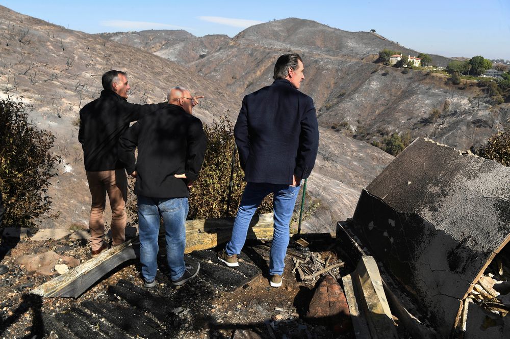 From left, L.A. Mayor Eric Garcetti, L.A. City Councilman Mike Bonin and California Governor Gavin Newsom view a burned home along Tigertail Road in Brentwood, Calif., Tuesday Oct. 29, 2019. (Wally Skalij/Los Angeles Times via AP, Pool) From left, L.A. Mayor Eric Garcetti, L.A. City Councilman Mike Bonin and California Governor Gavin Newsom view a burned home along Tigertail Road in Brentwood, Calif., Tuesday Oct. 29, 2019. (Wally Skalij/Los Angeles Times via AP, Pool)