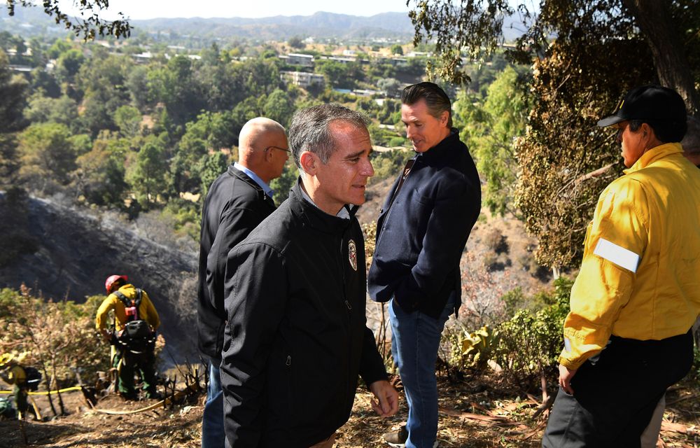 From left, L.A. City Councilman Mike Bonin, California L.A. City Mayor Eric Garcetti and California Governor Gavin Newsom tour Tigertail Road in Brentwood, Calif., Tuesday Oct. 29, 2019. (Wally Skalij/Los Angeles Times via AP, Pool) From left, L.A. City Councilman Mike Bonin, California L.A. City Mayor Eric Garcetti and California Governor Gavin Newsom tour Tigertail Road in Brentwood, Calif., Tuesday Oct. 29, 2019. (Wally Skalij/Los Angeles Times via AP, Pool)
