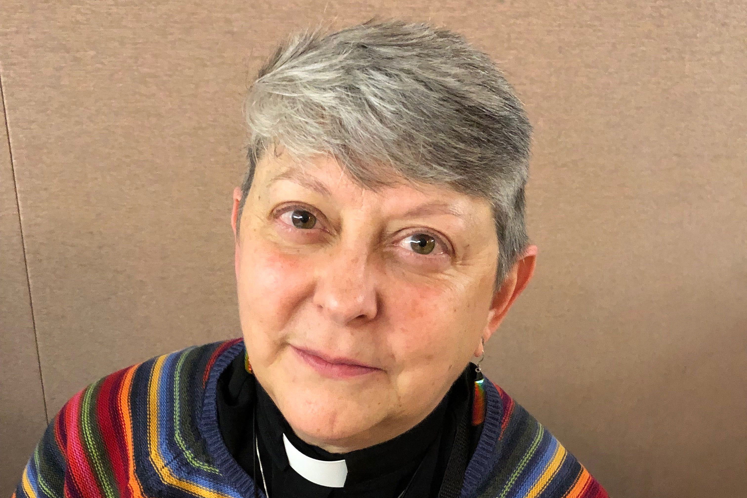 Lois McCullen Parr, 60, a United Methodist elder of Albion, Mich., poses for a picture at a national Methodist conference Monday, Feb. 25, at in St. Louis. Nearly 900 delegates will decide whether America's second-largest Protestant denomination will fracture due to divisions over same-sex marriage and the ordination of LGBT clergy. Parr identifies as bi-sexual and queer and said no one should be left out of God's love. (AP Photo/Jim Salter) Lois McCullen Parr, 60, a United Methodist elder of Albion, Mich., poses for a picture at a national Methodist conference Monday, Feb. 25, at in St. Louis. Nearly 900 delegates will decide whether America's second-largest Protestant denomination will fracture due to divisions over same-sex marriage and the ordination of LGBT clergy. Parr identifies as bi-sexual and queer and said no one should be left out of God's love. (AP Photo/Jim Salter)