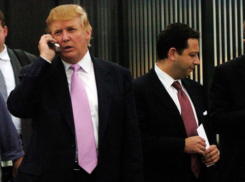 FILE - In this Sept. 14, 2005, file photo, businessman Donald Trump, left, talks on his cellphone with Felix Sater, right, outside after speaking at the Bixpo 2005 business convention at the Budweiser Events Center in Loveland, Colo. Sater, a Soviet emigre who befriended Trump over a series of development deals in the 2000s and pushed the Trump Tower Moscow project before and during the 2016 presidential campaign, has emerged as a key figure in House Democrats’ investigations into Trump’s Russia connections. (Cyrus McCrimmon/The Denver Post via AP) FILE - In this Sept. 14, 2005, file photo, businessman Donald Trump, left, talks on his cellphone with Felix Sater, right, outside after speaking at the Bixpo 2005 business convention at the Budweiser Events Center in Loveland, Colo. Sater, a Soviet emigre who befriended Trump over a series of development deals in the 2000s and pushed the Trump Tower Moscow project before and during the 2016 presidential campaign, has emerged as a key figure in House Democrats’ investigations into Trump’s Russia connections. (Cyrus McCrimmon/The Denver Post via AP)