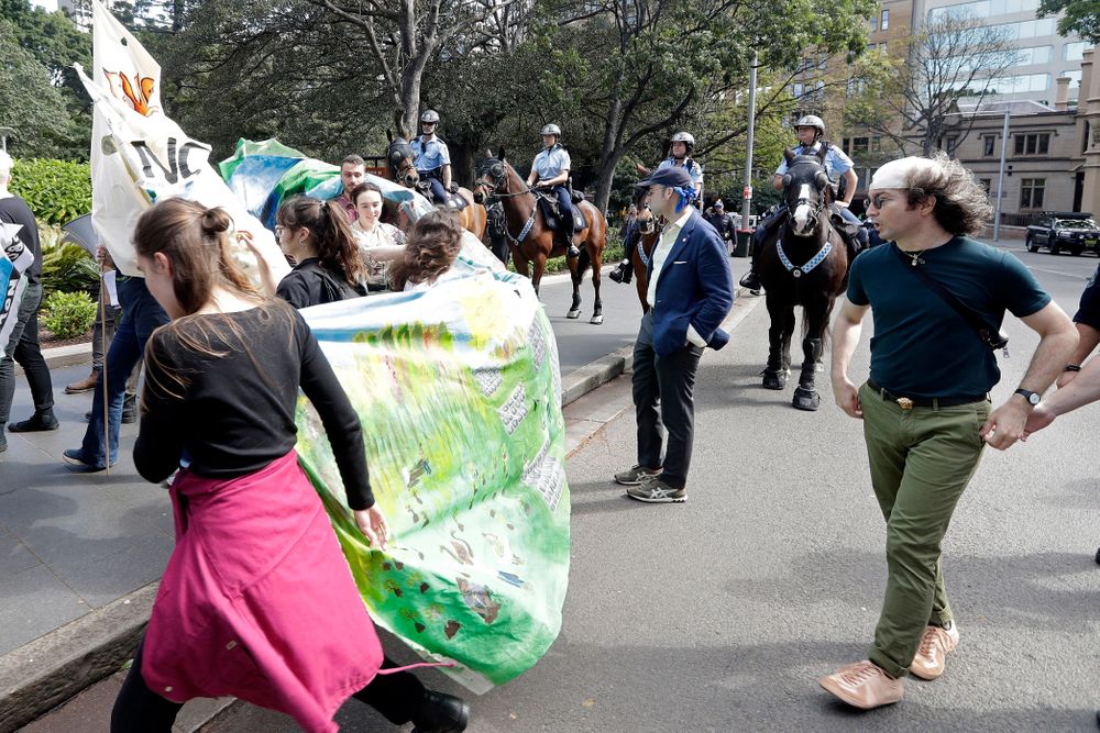 Mounted police block a path as thousands of protestors, many of them school students, attempt to march on the streets in Sydney, Friday, Sept. 20, 2019, calling for action to guard against climate change. Australia's acting prime minister Michael McCormack has described ongoing climate rallies as Mounted police block a path as thousands of protestors, many of them school students, attempt to march on the streets in Sydney, Friday, Sept. 20, 2019, calling for action to guard against climate change. Australia's acting prime minister Michael McCormack has described ongoing climate rallies as