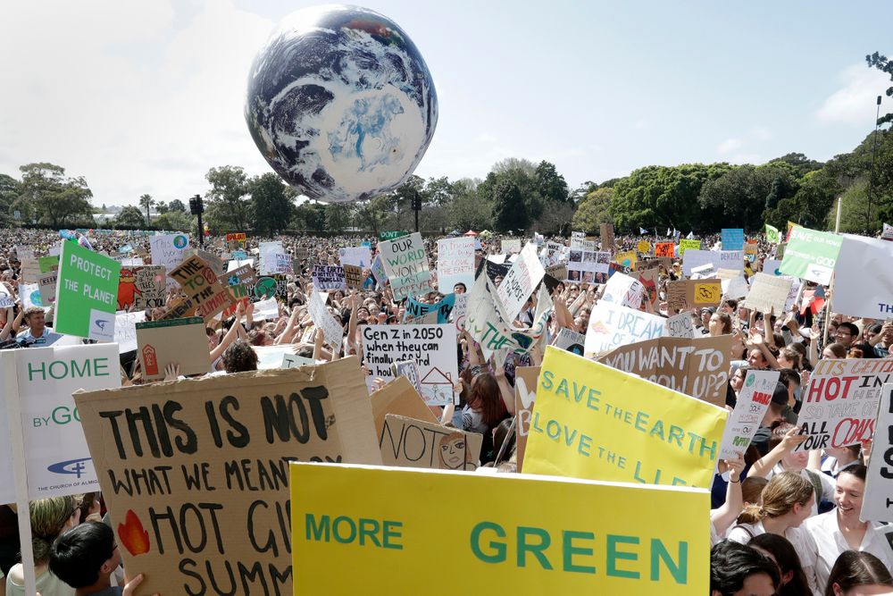 A large inflatable globe is bounced through the crowd as thousands of protestors, many of them school students, gather in Sydney, Friday, Sept. 20, 2019, calling for action to guard against climate change. Australia's acting Prime Minister Michael McCormack has described ongoing climate rallies as A large inflatable globe is bounced through the crowd as thousands of protestors, many of them school students, gather in Sydney, Friday, Sept. 20, 2019, calling for action to guard against climate change. Australia's acting Prime Minister Michael McCormack has described ongoing climate rallies as