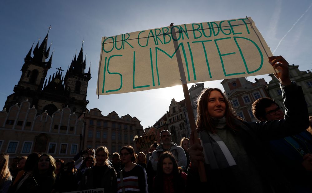 A girl holds a sign during a protest at the Old Town Square in Prague, Czech Republic, Friday, Sept. 20, 2019. Several hundreds of protestors gathered in response to a day of worldwide demonstrations calling for action to guard against climate change. (AP Photo/Petr David Josek) A girl holds a sign during a protest at the Old Town Square in Prague, Czech Republic, Friday, Sept. 20, 2019. Several hundreds of protestors gathered in response to a day of worldwide demonstrations calling for action to guard against climate change. (AP Photo/Petr David Josek)