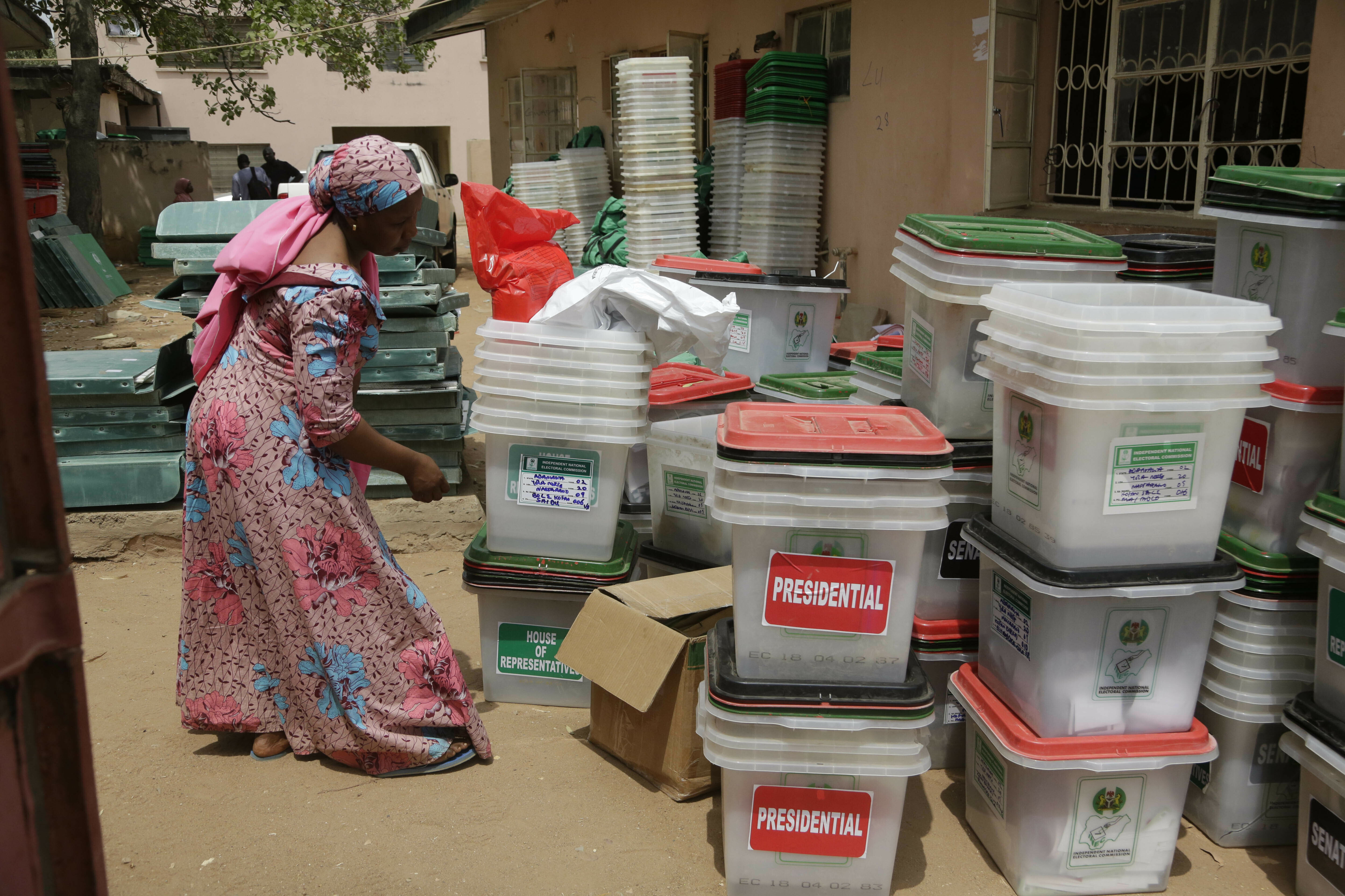 An electoral worker checks ballot boxes at the electoral commission office in Yola, Nigeria, Sunday, Feb. 24, 2019. Vote counting continued Sunday as Nigerians awaited the outcome of a presidential poll seen as a tight race between the president and a former vice president. (AP Photo/Sunday Alamba) An electoral worker checks ballot boxes at the electoral commission office in Yola, Nigeria, Sunday, Feb. 24, 2019. Vote counting continued Sunday as Nigerians awaited the outcome of a presidential poll seen as a tight race between the president and a former vice president. (AP Photo/Sunday Alamba)