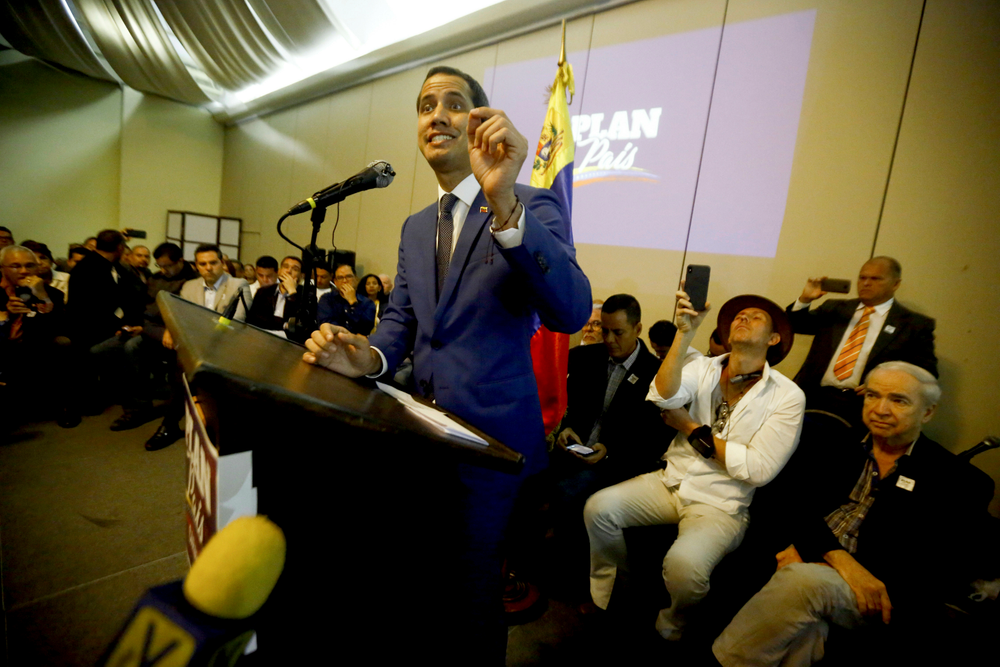 Venezuela's opposition leader and self-proclaimed interim president Juan Guaido delivers a speech during a meeting with supporters at a hotel in Valencia, Venezuela, June 7, 2019. A member of Venezuela's opposition said that a mediation effort by Norway is stalling over Nicolás Maduro's refusal to accept presidential elections to resolve the nation's political crisis. (AP Photo/Juan Carlos Hernandez) Venezuela's opposition leader and self-proclaimed interim president Juan Guaido delivers a speech during a meeting with supporters at a hotel in Valencia, Venezuela, June 7, 2019. A member of Venezuela's opposition said that a mediation effort by Norway is stalling over Nicolás Maduro's refusal to accept presidential elections to resolve the nation's political crisis. (AP Photo/Juan Carlos Hernandez)