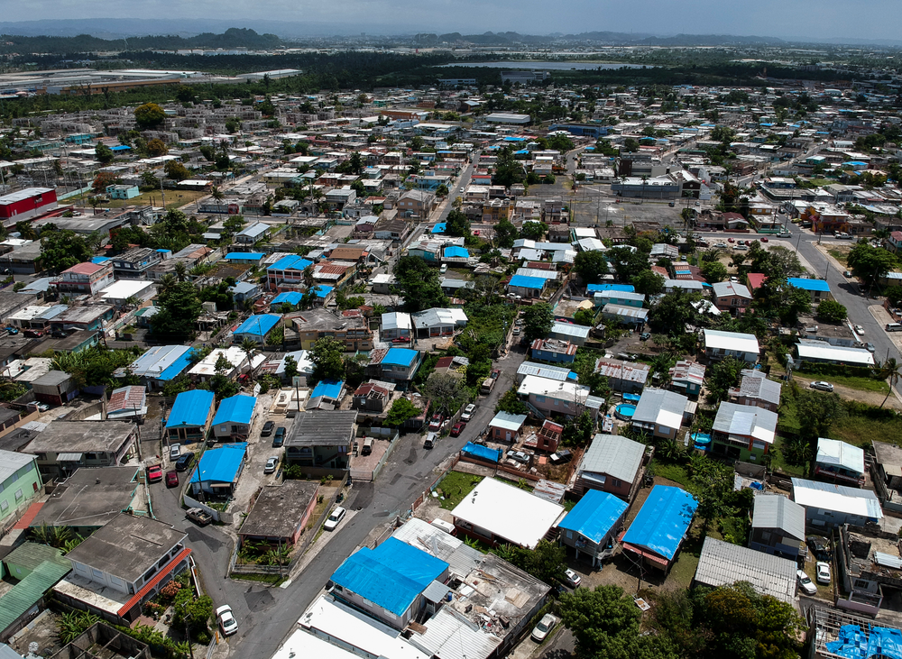 This June 18, 2018, file photo shows an aerial view of the Amelia neighborhood in the municipality of Catano, east of San Juan, Puerto Rico. The House has passed a $19 billion disaster aid bill that would deliver long-sought relief to farmers, victims of hurricanes and floods, and rebuild southern military bases. Democrats controlling the chamber are trying to dislodge the legislation from a Senate logjam over aid to hurricane-slammed Puerto Rico. (AP Photo/Dennis M. Rivera, File) This June 18, 2018, file photo shows an aerial view of the Amelia neighborhood in the municipality of Catano, east of San Juan, Puerto Rico. The House has passed a $19 billion disaster aid bill that would deliver long-sought relief to farmers, victims of hurricanes and floods, and rebuild southern military bases. Democrats controlling the chamber are trying to dislodge the legislation from a Senate logjam over aid to hurricane-slammed Puerto Rico. (AP Photo/Dennis M. Rivera, File)
