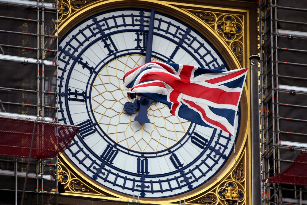 A Union flag waves against the backdrop of the clock facade of the Elizabeth Tower, which holds the bell known as “Big Ben”, in London, Friday, Nov. 1, 2019. British euroskeptic politician Nigel Farage is trying to ramp up the pressure on Conservative Prime Minister Boris Johnson. He warned that his Brexit Party will run against the Conservatives across the country in the Dec. 12 general election unless Johnson abandons his divorce deal with the European Union. (AP Photo/Alberto Pezzali) A Union flag waves against the backdrop of the clock facade of the Elizabeth Tower, which holds the bell known as “Big Ben”, in London, Friday, Nov. 1, 2019. British euroskeptic politician Nigel Farage is trying to ramp up the pressure on Conservative Prime Minister Boris Johnson. He warned that his Brexit Party will run against the Conservatives across the country in the Dec. 12 general election unless Johnson abandons his divorce deal with the European Union. (AP Photo/Alberto Pezzali)
