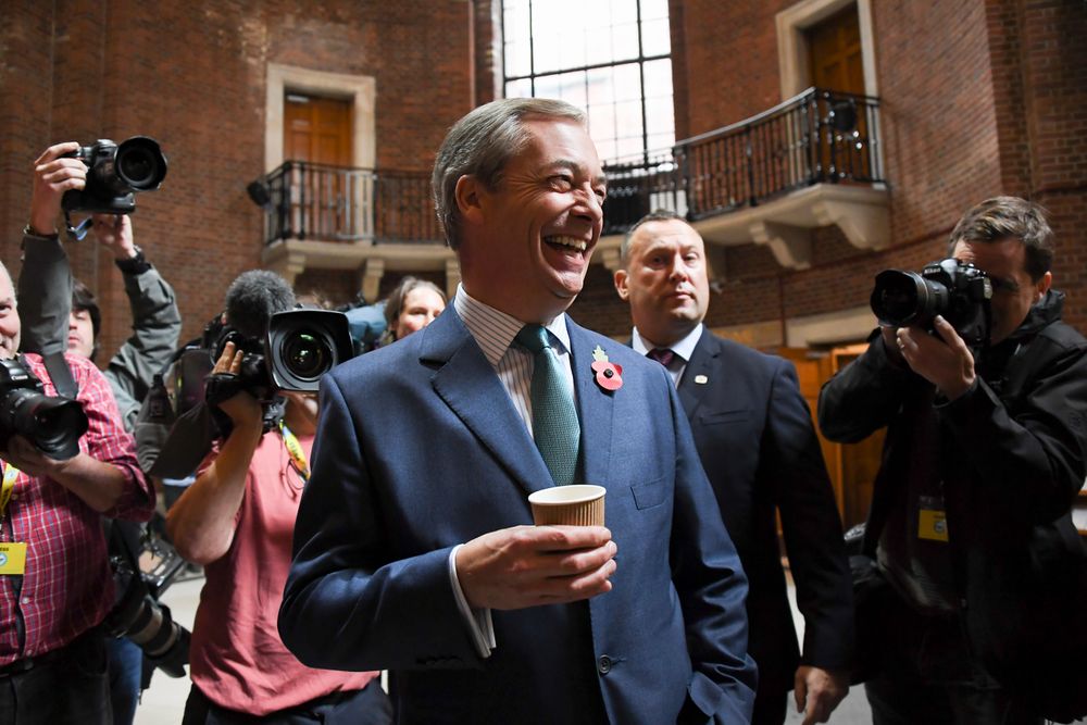 Brexit Party leader Nigel Farage launches his party's manifesto ahead of the upcoming General Election, in London, Friday, Nov. 1, 2019. Farage kicked off the Brexit Party campaign Friday, for Britain's December general election. (AP Photo/Alberto Pezzali) Brexit Party leader Nigel Farage launches his party's manifesto ahead of the upcoming General Election, in London, Friday, Nov. 1, 2019. Farage kicked off the Brexit Party campaign Friday, for Britain's December general election. (AP Photo/Alberto Pezzali)