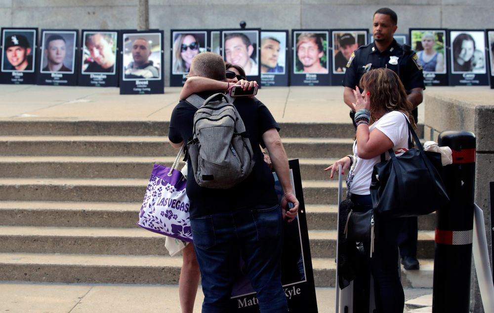 Protesters gather outside a courthouse on Friday, Aug. 2, 2019, in Boston, where a judge was to hear arguments in Massachusetts' lawsuit against Purdue Pharma over its role in the national drug epidemic. Organizers said they wanted to continue to put pressure on the Connecticut pharmaceutical company and the Sackler family that owns it. (AP Photo/Charles Krupa) Protesters gather outside a courthouse on Friday, Aug. 2, 2019, in Boston, where a judge was to hear arguments in Massachusetts' lawsuit against Purdue Pharma over its role in the national drug epidemic. Organizers said they wanted to continue to put pressure on the Connecticut pharmaceutical company and the Sackler family that owns it. (AP Photo/Charles Krupa)