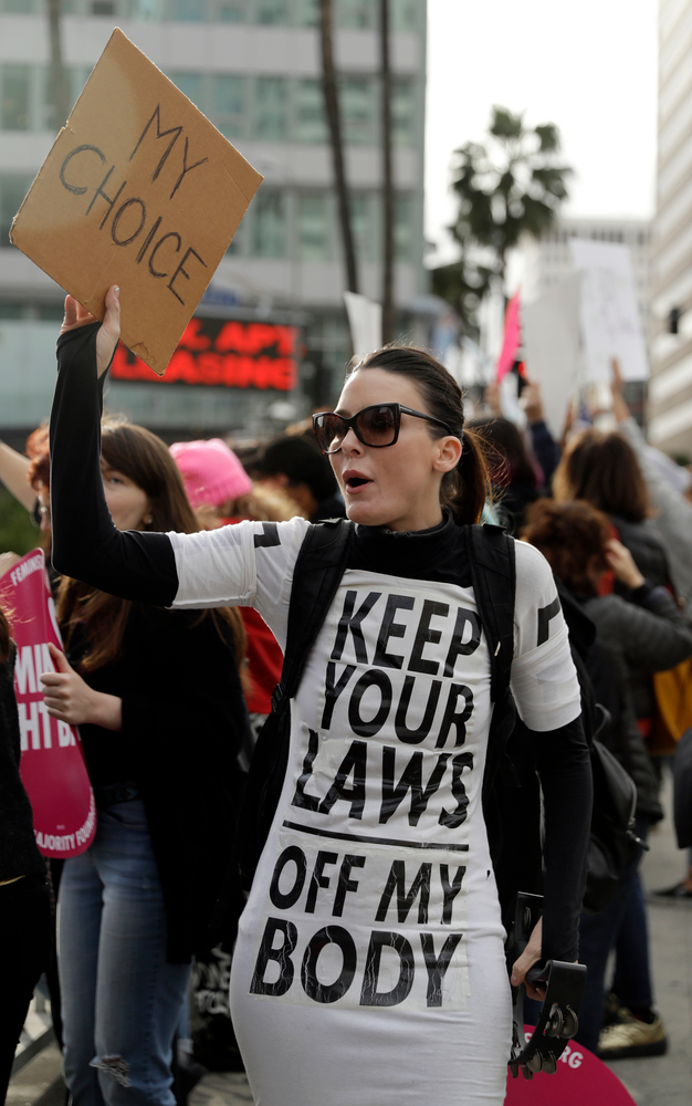 FILE - In this Tuesday, May 21, 2019 file photo, a demonstrator shouts slogans during a rally in support of abortion rights in Los Angeles. (AP Photo/Marcio Jose Sanchez) FILE - In this Tuesday, May 21, 2019 file photo, a demonstrator shouts slogans during a rally in support of abortion rights in Los Angeles. (AP Photo/Marcio Jose Sanchez)
