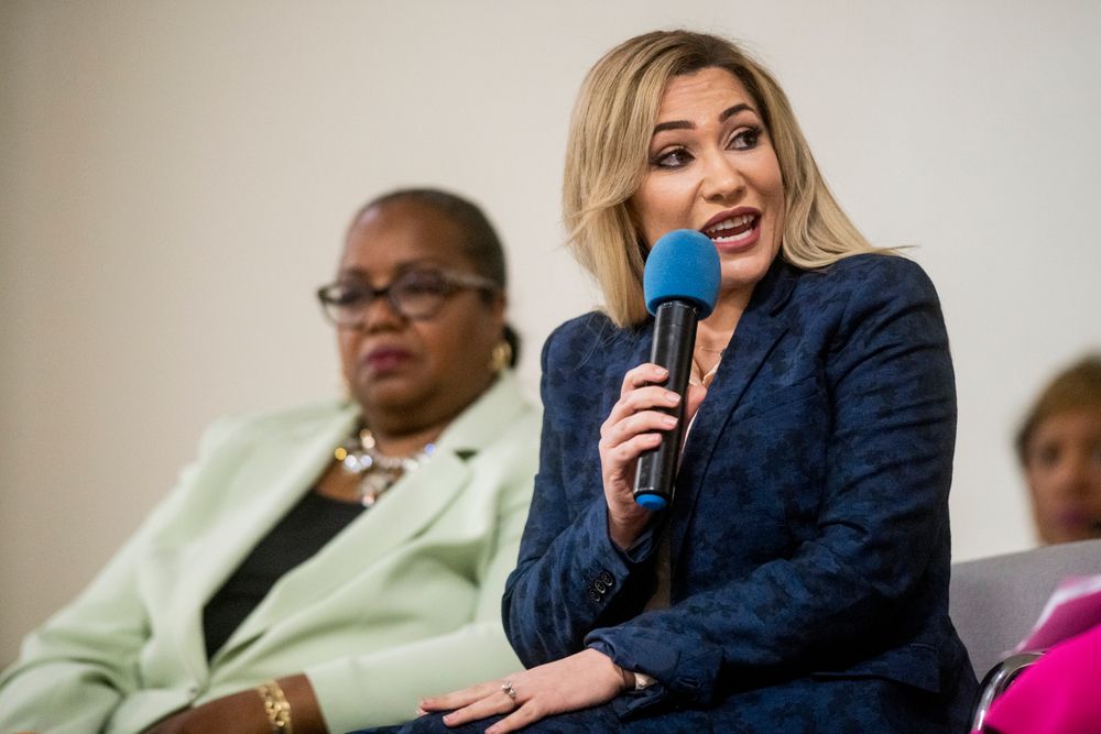 Michigan Solicitor General Fadwa Hammoud speaks during a community meeting with Flint water prosecutors at UAW Local 659 on Friday, June 28, 2019, in Flint, Mich., two weeks after dismissing the charges in the criminal cases. The prosecutors who dropped charges against eight people in the Flint water scandal explained their decision in a public forum Friday night, telling frustrated and shocked residents they must look at hundreds of mobile devices and millions of documents that a previous investigative team never reviewed. (Jake May/MLive.com/The Flint Journal via AP) Michigan Solicitor General Fadwa Hammoud speaks during a community meeting with Flint water prosecutors at UAW Local 659 on Friday, June 28, 2019, in Flint, Mich., two weeks after dismissing the charges in the criminal cases. The prosecutors who dropped charges against eight people in the Flint water scandal explained their decision in a public forum Friday night, telling frustrated and shocked residents they must look at hundreds of mobile devices and millions of documents that a previous investigative team never reviewed. (Jake May/MLive.com/The Flint Journal via AP)