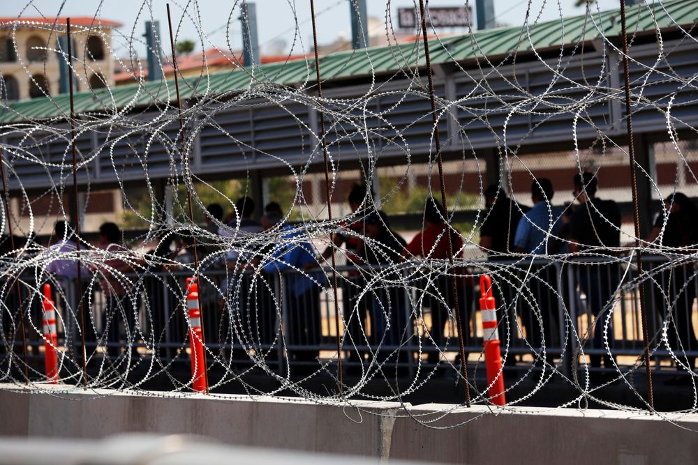FILE - In this July 16, 2019, file photo, people line up to cross the border into the United States on International Bridge 1, in Nuevo Laredo, Mexico. Mexicans are increasingly the face of asylum in the United States, replacing Central Americans who dominated last year's caravan and a surge of families that brought border arrests to a 13-year high in May. It is unclear precisely what is driving the change, perhaps a mix of U.S. policies and violence in Mexico. U.S. Customs and Border Protection figures show fewer Mexicans are crossing, but the drop in Central Americans is much sharper, making Mexicans a bigger part of the mix. (AP Photo/Marco Ugarte, File) FILE - In this July 16, 2019, file photo, people line up to cross the border into the United States on International Bridge 1, in Nuevo Laredo, Mexico. Mexicans are increasingly the face of asylum in the United States, replacing Central Americans who dominated last year's caravan and a surge of families that brought border arrests to a 13-year high in May. It is unclear precisely what is driving the change, perhaps a mix of U.S. policies and violence in Mexico. U.S. Customs and Border Protection figures show fewer Mexicans are crossing, but the drop in Central Americans is much sharper, making Mexicans a bigger part of the mix. (AP Photo/Marco Ugarte, File)