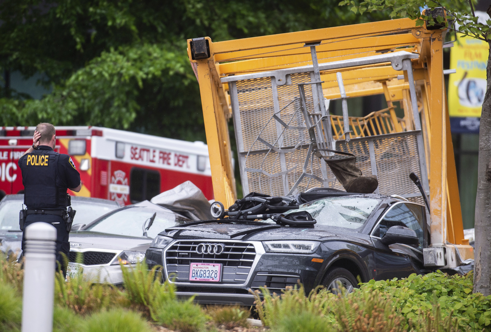 Emergency crews work the scene of a construction crane collapse near the intersection of Mercer Street and Fairview Avenue near Interstate 5 in Seattle, on Saturday, April 27, 2019. Authorities say several people have died and a few others are hospitalized after the construction crane fell onto a street in downtown Seattle Saturday afternoon. (Joshua Bessex/The News Tribune via AP) Emergency crews work the scene of a construction crane collapse near the intersection of Mercer Street and Fairview Avenue near Interstate 5 in Seattle, on Saturday, April 27, 2019. Authorities say several people have died and a few others are hospitalized after the construction crane fell onto a street in downtown Seattle Saturday afternoon. (Joshua Bessex/The News Tribune via AP)