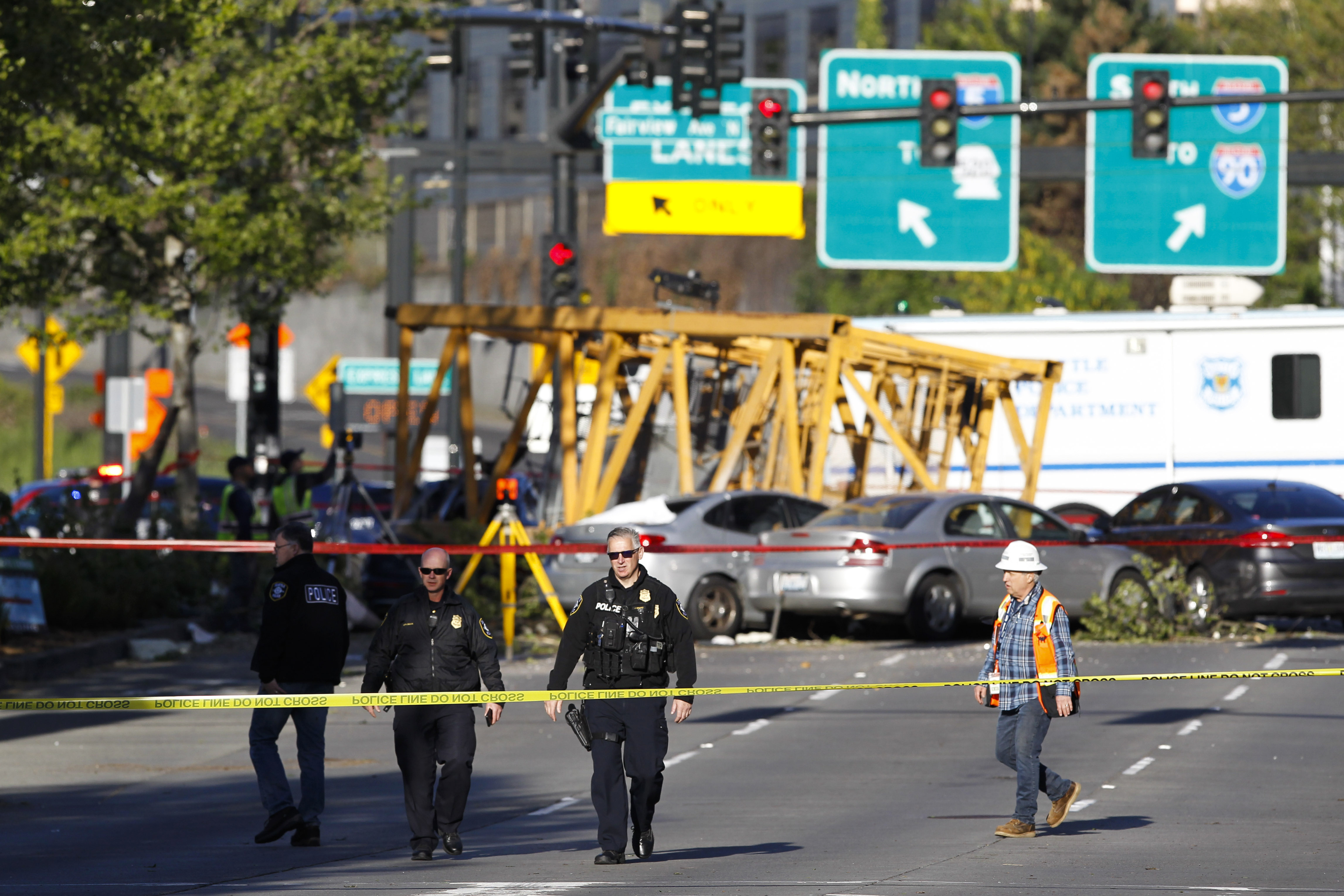 Emergency crews work at the scene of a construction crane collapse where several people were killed and others were injured Saturday, April 27, 2019, in the South Lake Union neighborhood of Seattle. The crane collapsed near the intersection of Mercer Street and Fairview Avenue pinning cars underneath it near Interstate 5 shortly after 3 p.m. (AP Photo/Joe Nicholson) Emergency crews work at the scene of a construction crane collapse where several people were killed and others were injured Saturday, April 27, 2019, in the South Lake Union neighborhood of Seattle. The crane collapsed near the intersection of Mercer Street and Fairview Avenue pinning cars underneath it near Interstate 5 shortly after 3 p.m. (AP Photo/Joe Nicholson)