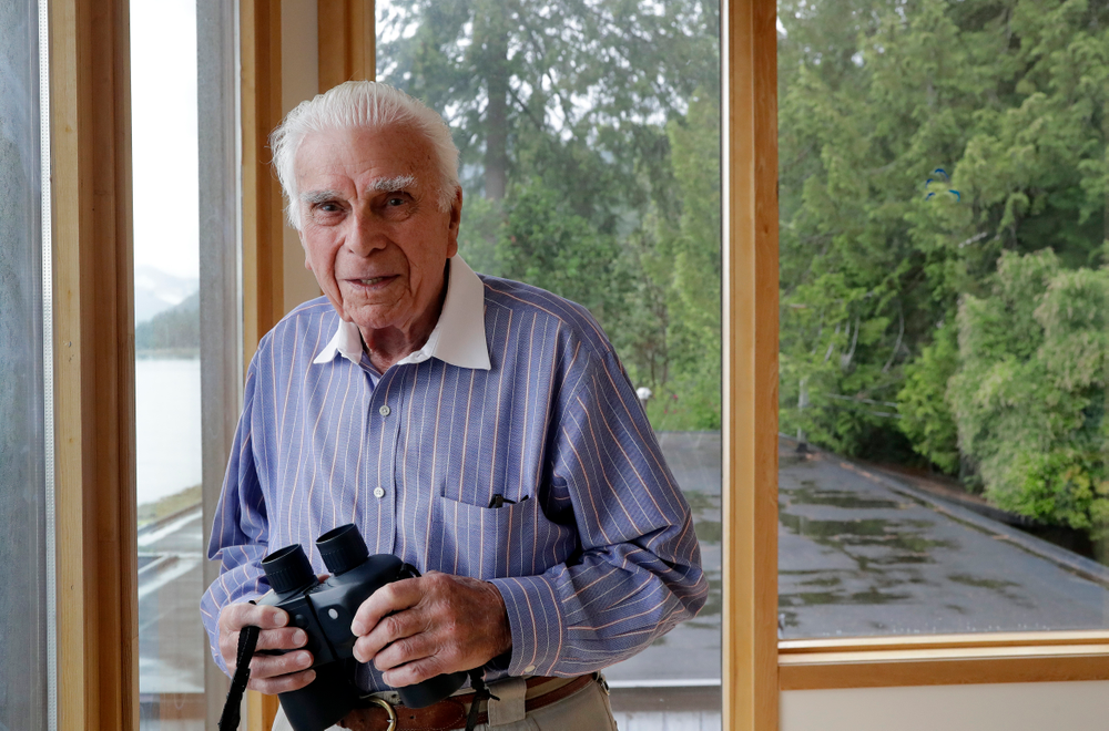 In this photo taken Monday, May 20, 2019, D-Day veteran Norman Harold Kirby poses for a photo at his home in Lions Bay, Canada. The Canadian from British Columbia had joined the army when he was only 17 and was barely a 19-year-old private when he climbed into the landing craft that would take him to shore on June 6, 1944. (AP Photo/Elaine Thompson) In this photo taken Monday, May 20, 2019, D-Day veteran Norman Harold Kirby poses for a photo at his home in Lions Bay, Canada. The Canadian from British Columbia had joined the army when he was only 17 and was barely a 19-year-old private when he climbed into the landing craft that would take him to shore on June 6, 1944. (AP Photo/Elaine Thompson)