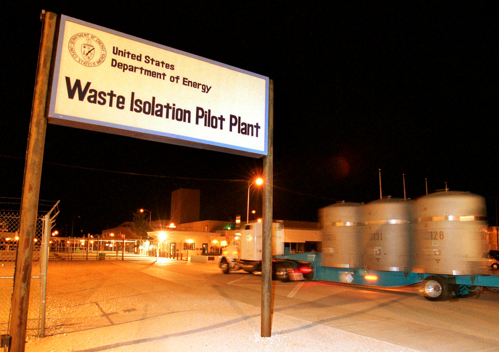 FILE - The first load of nuclear waste arrives in this March 26, 1999 file photo, at the Waste Isolation Pilot Plant (WIPP) site in Carlsbad, N.M., from Los Alamos National Laboratory. Twenty years and more than 12,380 shipments later, tons of Cold War-era waste from decades of bomb-making and nuclear research across the U.S. have been stashed in the salt caverns that make up the underground facility. (AP Photo/Thomas Herbert) FILE - The first load of nuclear waste arrives in this March 26, 1999 file photo, at the Waste Isolation Pilot Plant (WIPP) site in Carlsbad, N.M., from Los Alamos National Laboratory. Twenty years and more than 12,380 shipments later, tons of Cold War-era waste from decades of bomb-making and nuclear research across the U.S. have been stashed in the salt caverns that make up the underground facility. (AP Photo/Thomas Herbert)