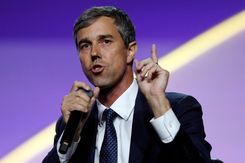 FILE - In this July 24, 2019, file photo, Democratic presidential candidate former Texas Rep. Beto O'Rourke, speaks during a candidates forum at the 110th NAACP National Convention in Detroit. As the U.S. economy flashes recession warning signs, Democratic presidential candidates are leveling pre-emptive blame on President Donald Trump. They argue that his aggressive and unpredictable tariff policies are to blame for gloomy economic forecasts. (AP Photo/Carlos Osorio) FILE - In this July 24, 2019, file photo, Democratic presidential candidate former Texas Rep. Beto O'Rourke, speaks during a candidates forum at the 110th NAACP National Convention in Detroit. As the U.S. economy flashes recession warning signs, Democratic presidential candidates are leveling pre-emptive blame on President Donald Trump. They argue that his aggressive and unpredictable tariff policies are to blame for gloomy economic forecasts. (AP Photo/Carlos Osorio)