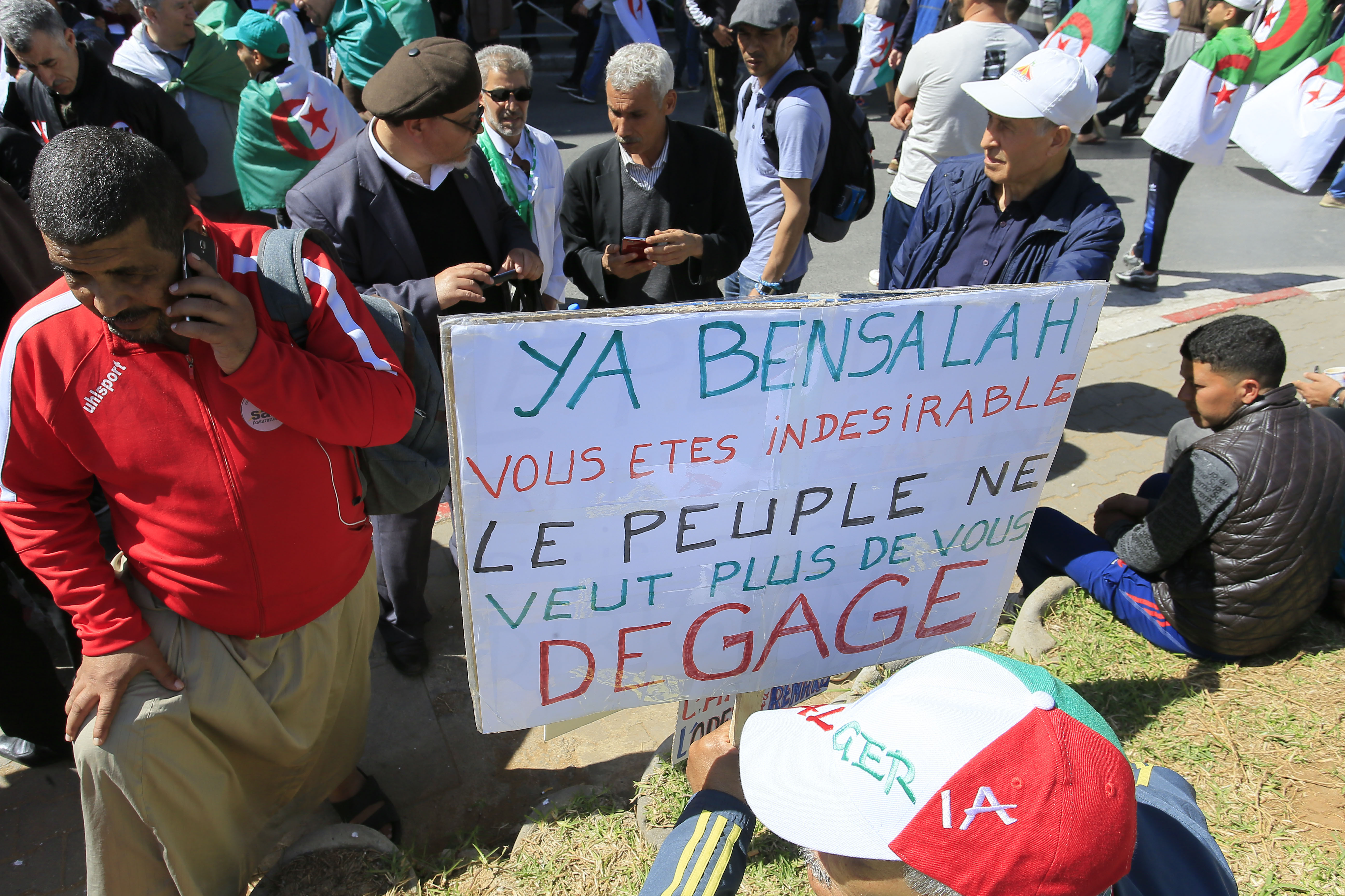 A placard reads A placard reads