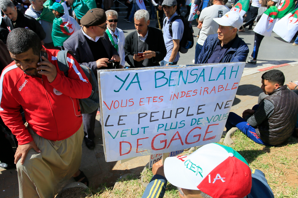 A placard reads A placard reads