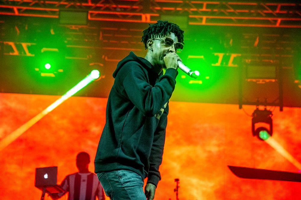 FILE - In this Oct. 28, 2018, file photo, 21 Savage performs at the Voodoo Music Experience in New Orleans. (Photo by Amy Harris/Invision/AP, File) FILE - In this Oct. 28, 2018, file photo, 21 Savage performs at the Voodoo Music Experience in New Orleans. (Photo by Amy Harris/Invision/AP, File)