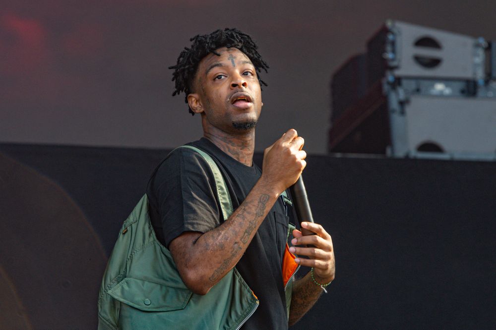 FILE - In this Aug. 2, 2019, file photo, 21 Savage performs at the Lollapalooza music festival in Chicago. (Photo by Amy Harris/Invision/AP, File) FILE - In this Aug. 2, 2019, file photo, 21 Savage performs at the Lollapalooza music festival in Chicago. (Photo by Amy Harris/Invision/AP, File)