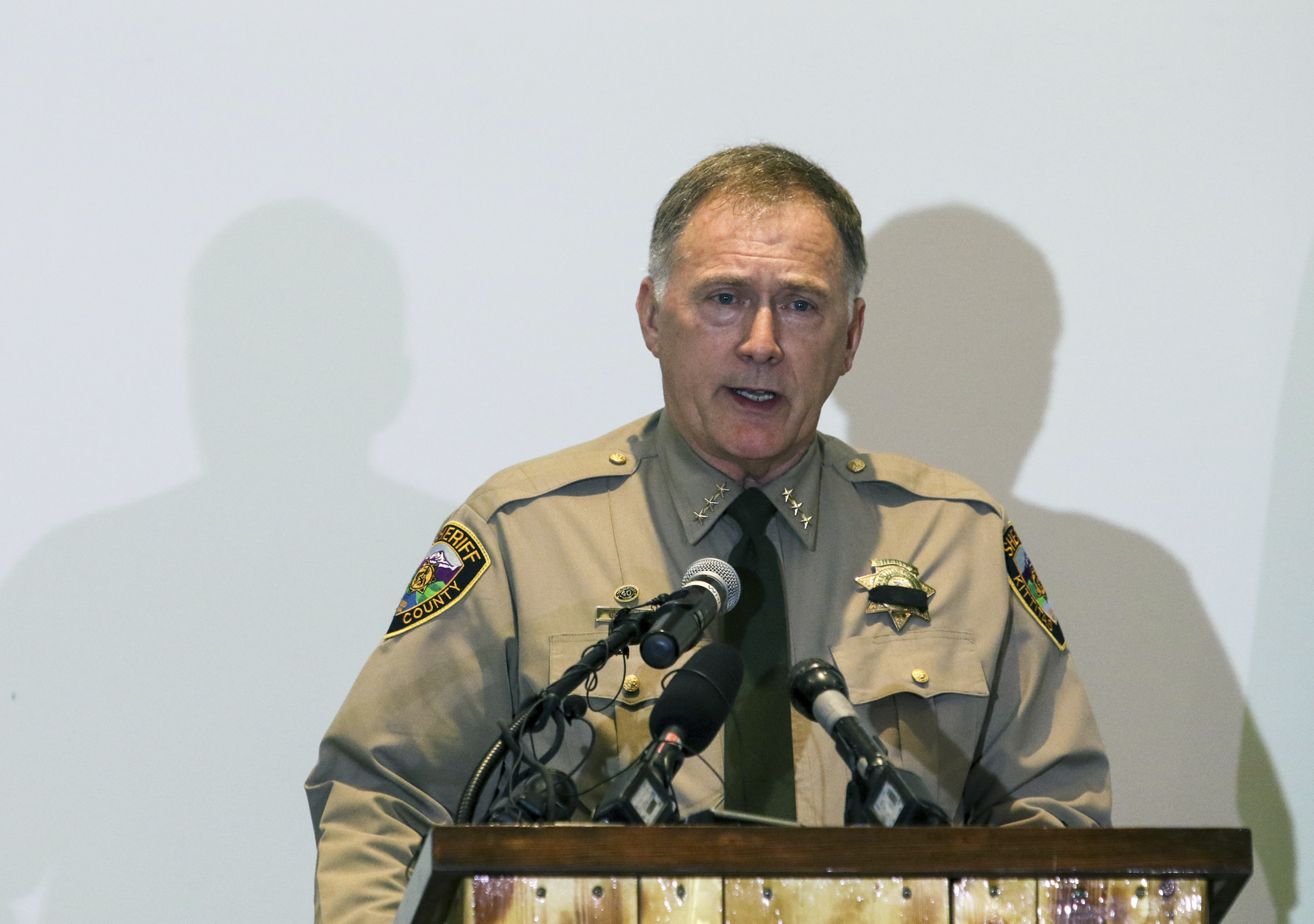 Kittitas County Sheriff Gene Dana speaks at a news conference, Wednesday, March 20, 2019, in Ellensburg, Wash. about the death of Deputy Ryan Thompson, who was killed Tuesday evening when he and a Kittitas Police officer exchanged gunfire with a road-rage driving suspect in Kittitas, Wash. The driver of the vehicle was also shot and later died at a hospital. (Jake Green/The Daily Record via AP) Kittitas County Sheriff Gene Dana speaks at a news conference, Wednesday, March 20, 2019, in Ellensburg, Wash. about the death of Deputy Ryan Thompson, who was killed Tuesday evening when he and a Kittitas Police officer exchanged gunfire with a road-rage driving suspect in Kittitas, Wash. The driver of the vehicle was also shot and later died at a hospital. (Jake Green/The Daily Record via AP)