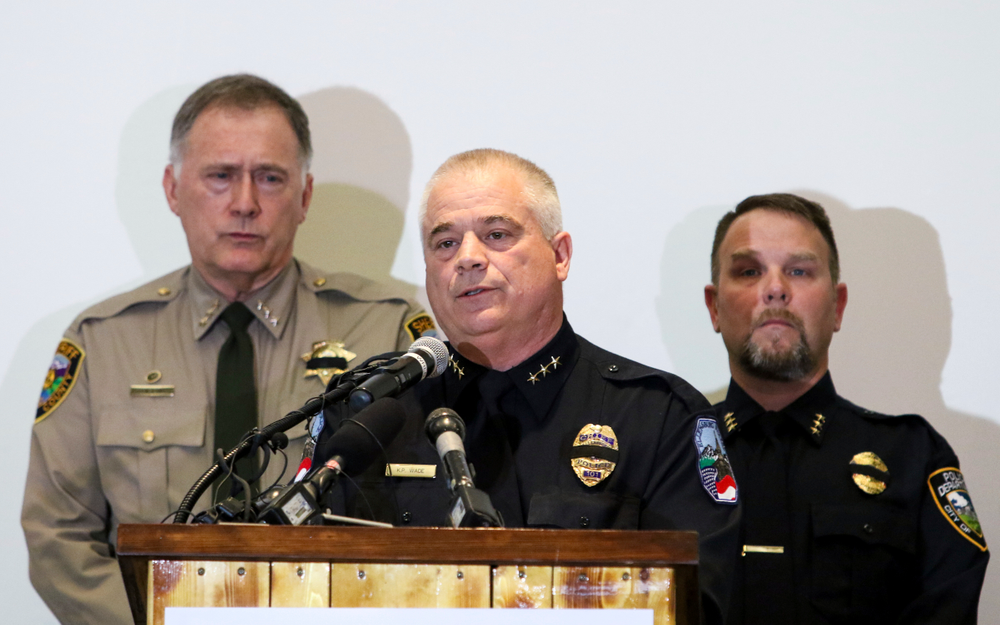 Ellensburg Police Chief Ken Wade, center, talks to reporters as Kittitas County Sheriff Gene Dana, left, and Kittitas Police Chief Chris Taylor, right, look on during a news conference, Wednesday, March 20, 2019, in Ellensburg, Wash. Wade was talking about the death of Deputy Ryan Thompson, who was killed Tuesday evening when he and a Kittitas Police officer exchanged gunfire with a road-rage driving suspect in Kittitas, Wash. The driver of the vehicle was also shot and later died at a hospital. (Jake Green/The Daily Record via AP) Ellensburg Police Chief Ken Wade, center, talks to reporters as Kittitas County Sheriff Gene Dana, left, and Kittitas Police Chief Chris Taylor, right, look on during a news conference, Wednesday, March 20, 2019, in Ellensburg, Wash. Wade was talking about the death of Deputy Ryan Thompson, who was killed Tuesday evening when he and a Kittitas Police officer exchanged gunfire with a road-rage driving suspect in Kittitas, Wash. The driver of the vehicle was also shot and later died at a hospital. (Jake Green/The Daily Record via AP)