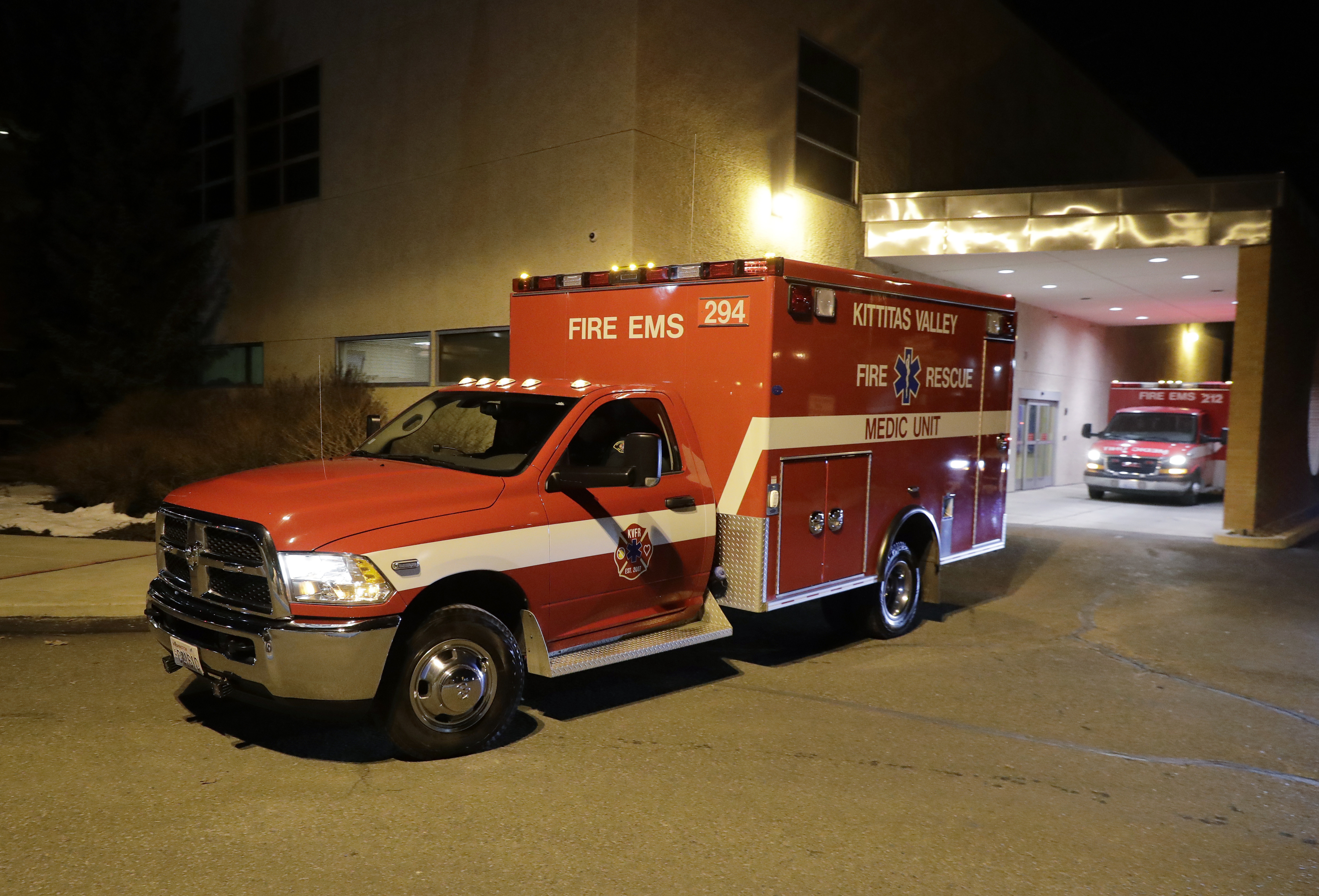 A Kittitas Valley Fire & Rescue ambulance carries the body of a Kittitas County Sheriff's deputy away from Kittitas Valley Healthcare Hospital, in the early morning hours of Wednesday, March 20, 2019, in Ellensburg, Wash. A Kittitas County Sheriff's deputy was killed and a police officer was injured after an exchange of gunfire during an attempted traffic stop. (AP Photo/Ted S. Warren) A Kittitas Valley Fire & Rescue ambulance carries the body of a Kittitas County Sheriff's deputy away from Kittitas Valley Healthcare Hospital, in the early morning hours of Wednesday, March 20, 2019, in Ellensburg, Wash. A Kittitas County Sheriff's deputy was killed and a police officer was injured after an exchange of gunfire during an attempted traffic stop. (AP Photo/Ted S. Warren)