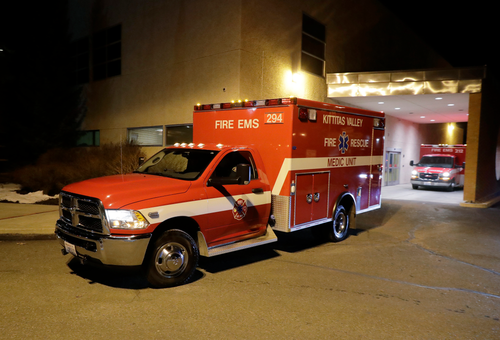 A Kittitas Valley Fire & Rescue ambulance carries the body of a Kittitas County Sheriff's deputy away from Kittitas Valley Healthcare Hospital, in the early morning hours of Wednesday, March 20, 2019, in Ellensburg, Wash. A Kittitas County Sheriff's deputy was killed and a police officer was injured after an exchange of gunfire during an attempted traffic stop. (AP Photo/Ted S. Warren) A Kittitas Valley Fire & Rescue ambulance carries the body of a Kittitas County Sheriff's deputy away from Kittitas Valley Healthcare Hospital, in the early morning hours of Wednesday, March 20, 2019, in Ellensburg, Wash. A Kittitas County Sheriff's deputy was killed and a police officer was injured after an exchange of gunfire during an attempted traffic stop. (AP Photo/Ted S. Warren)
