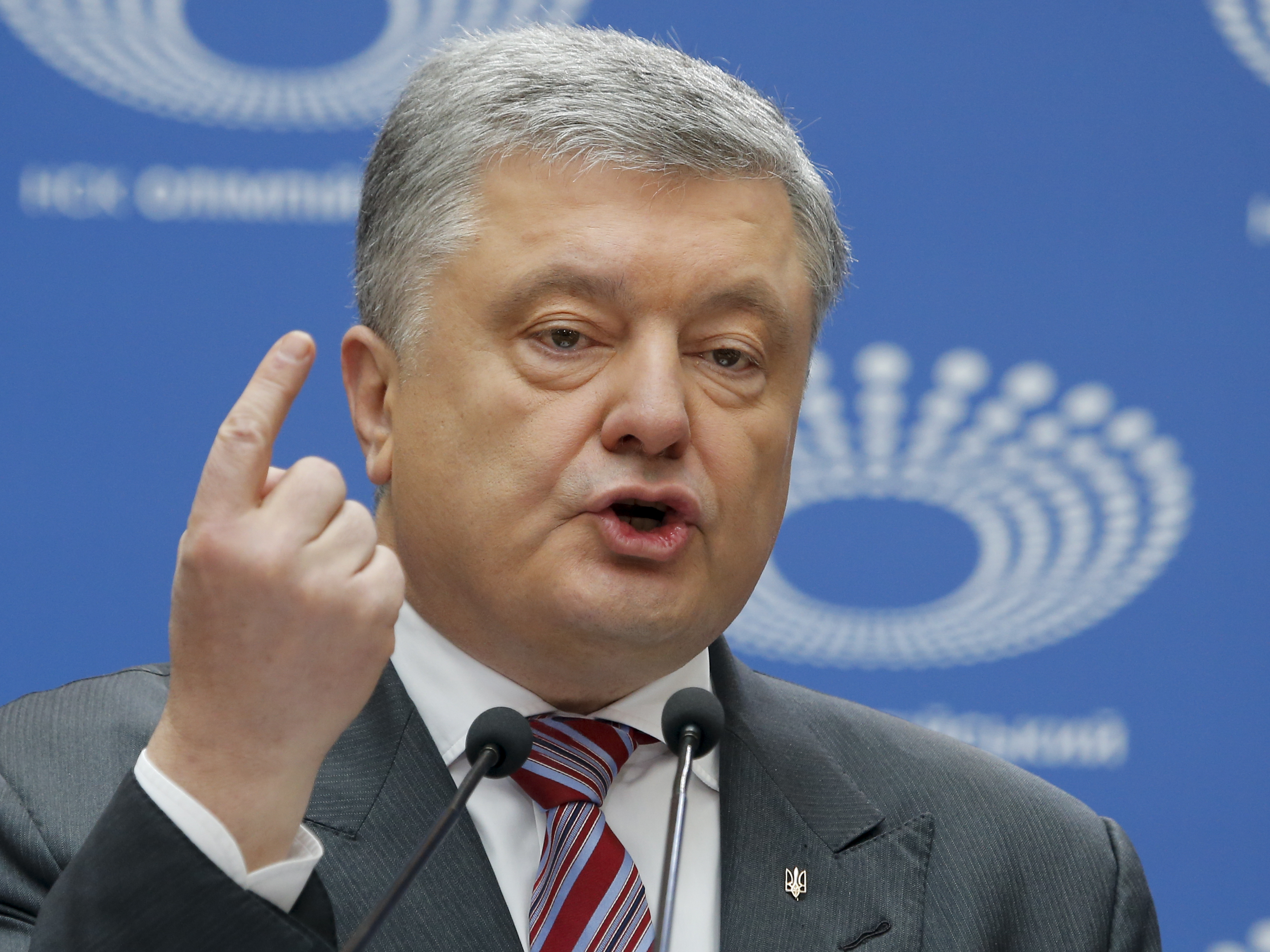 Ukrainian President Petro Poroshenko gestures as he answers to a journalist's question ahead of the presidential elections on April 21, at the Olympic stadium in Kiev, Ukraine, Sunday, April 14, 2019. With one week remaining until Ukraine's presidential election, incumbent Petro Poroshenko has come to the country's largest stadium for a proposed debate where his opponent didn't show up. (AP Photo/Efrem Lukatsky) Ukrainian President Petro Poroshenko gestures as he answers to a journalist's question ahead of the presidential elections on April 21, at the Olympic stadium in Kiev, Ukraine, Sunday, April 14, 2019. With one week remaining until Ukraine's presidential election, incumbent Petro Poroshenko has come to the country's largest stadium for a proposed debate where his opponent didn't show up. (AP Photo/Efrem Lukatsky)