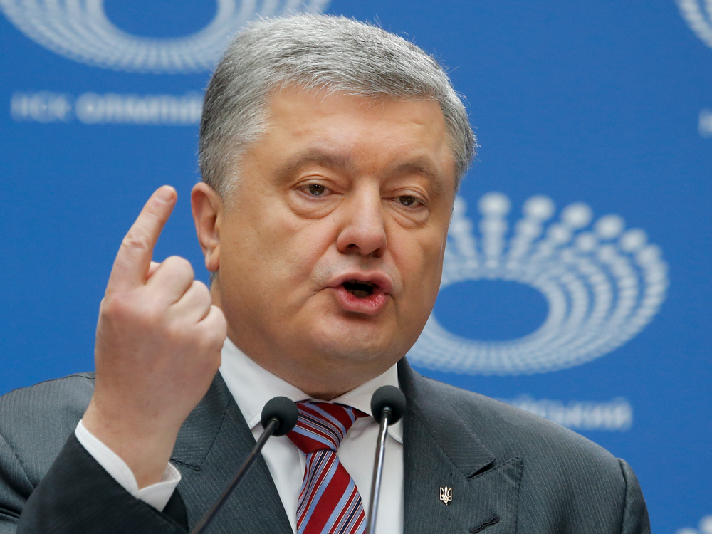 Ukrainian President Petro Poroshenko gestures as he answers to a journalist's question ahead of the presidential elections on April 21, at the Olympic stadium in Kiev, Ukraine, Sunday, April 14, 2019. With one week remaining until Ukraine's presidential election, incumbent Petro Poroshenko has come to the country's largest stadium for a proposed debate where his opponent didn't show up. (AP Photo/Efrem Lukatsky) Ukrainian President Petro Poroshenko gestures as he answers to a journalist's question ahead of the presidential elections on April 21, at the Olympic stadium in Kiev, Ukraine, Sunday, April 14, 2019. With one week remaining until Ukraine's presidential election, incumbent Petro Poroshenko has come to the country's largest stadium for a proposed debate where his opponent didn't show up. (AP Photo/Efrem Lukatsky)
