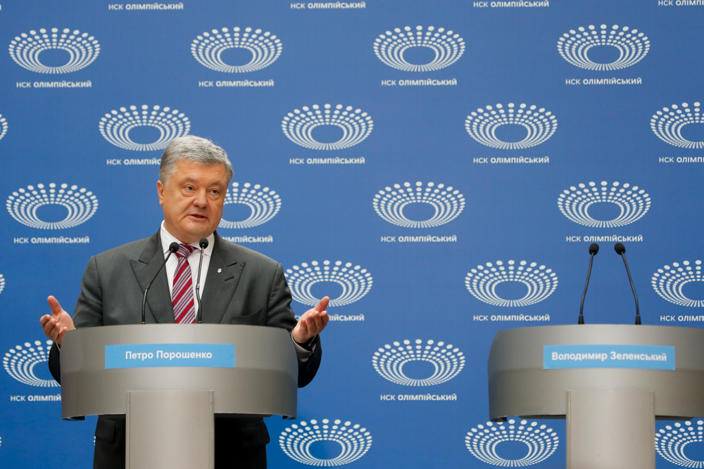 Ukrainian President Petro Poroshenko gestures as he answers to a journalist's question ahead of the presidential elections on April 21, at the Olympic stadium in Kiev, Ukraine, Sunday, April 14, 2019. (AP Photo/Efrem Lukatsky) Ukrainian President Petro Poroshenko gestures as he answers to a journalist's question ahead of the presidential elections on April 21, at the Olympic stadium in Kiev, Ukraine, Sunday, April 14, 2019. (AP Photo/Efrem Lukatsky)