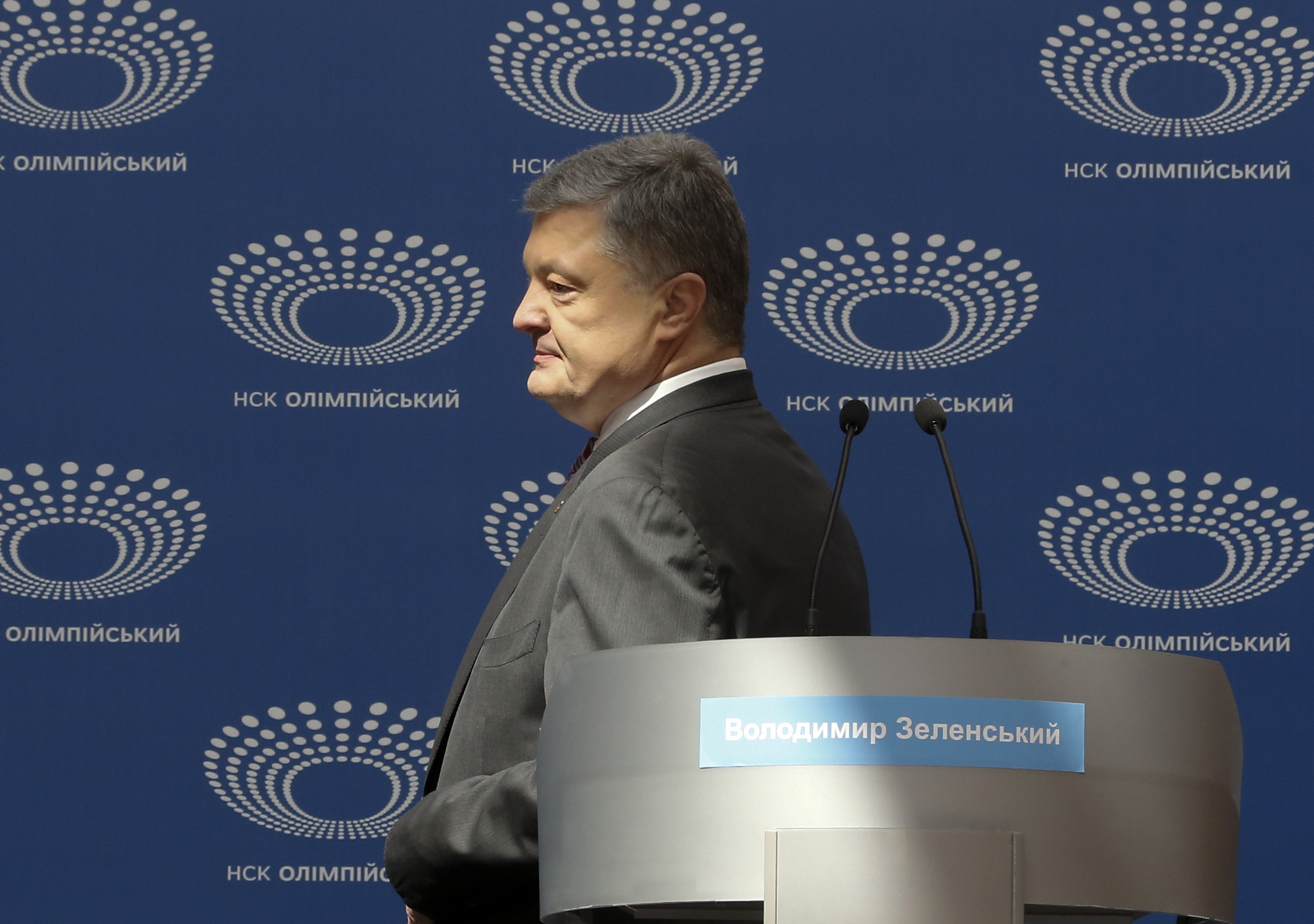 Ukrainian President Petro Poroshenko arrives to deliver his speech ahead of the presidential elections on April 21, at the Olympic stadium in Kiev, Ukraine, Sunday, April 14, 2019. (AP Photo/Efrem Lukatsky) Ukrainian President Petro Poroshenko arrives to deliver his speech ahead of the presidential elections on April 21, at the Olympic stadium in Kiev, Ukraine, Sunday, April 14, 2019. (AP Photo/Efrem Lukatsky)