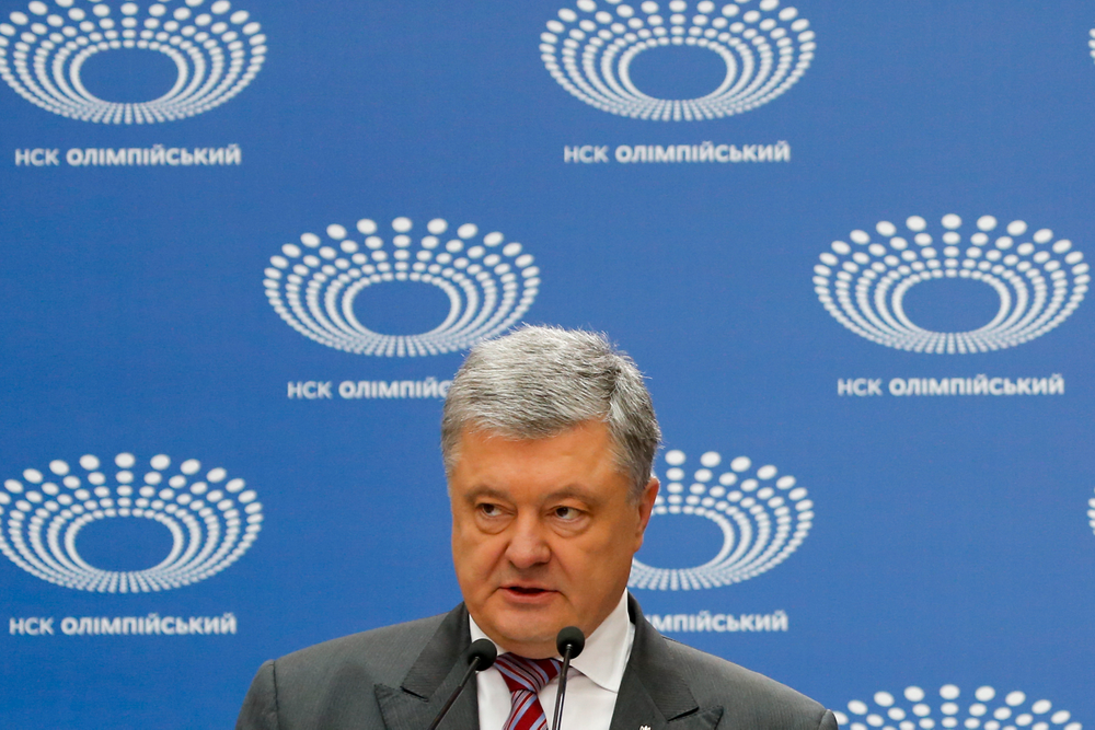 Ukrainian President Petro Poroshenko answers to a journalist's question ahead of the presidential elections on April 21, at the Olympic stadium in Kiev, Ukraine, Sunday, April 14, 2019. (AP Photo/Efrem Lukatsky) Ukrainian President Petro Poroshenko answers to a journalist's question ahead of the presidential elections on April 21, at the Olympic stadium in Kiev, Ukraine, Sunday, April 14, 2019. (AP Photo/Efrem Lukatsky)