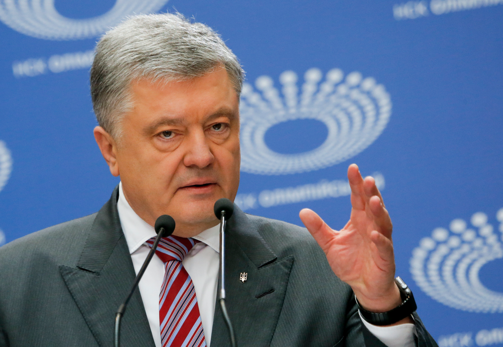 Ukrainian President Petro Poroshenko gestures as he answers to a journalist's question ahead of the presidential elections on April 21, at the Olympic stadium in Kiev, Ukraine, Sunday, April 14, 2019. (AP Photo/Efrem Lukatsky) Ukrainian President Petro Poroshenko gestures as he answers to a journalist's question ahead of the presidential elections on April 21, at the Olympic stadium in Kiev, Ukraine, Sunday, April 14, 2019. (AP Photo/Efrem Lukatsky)