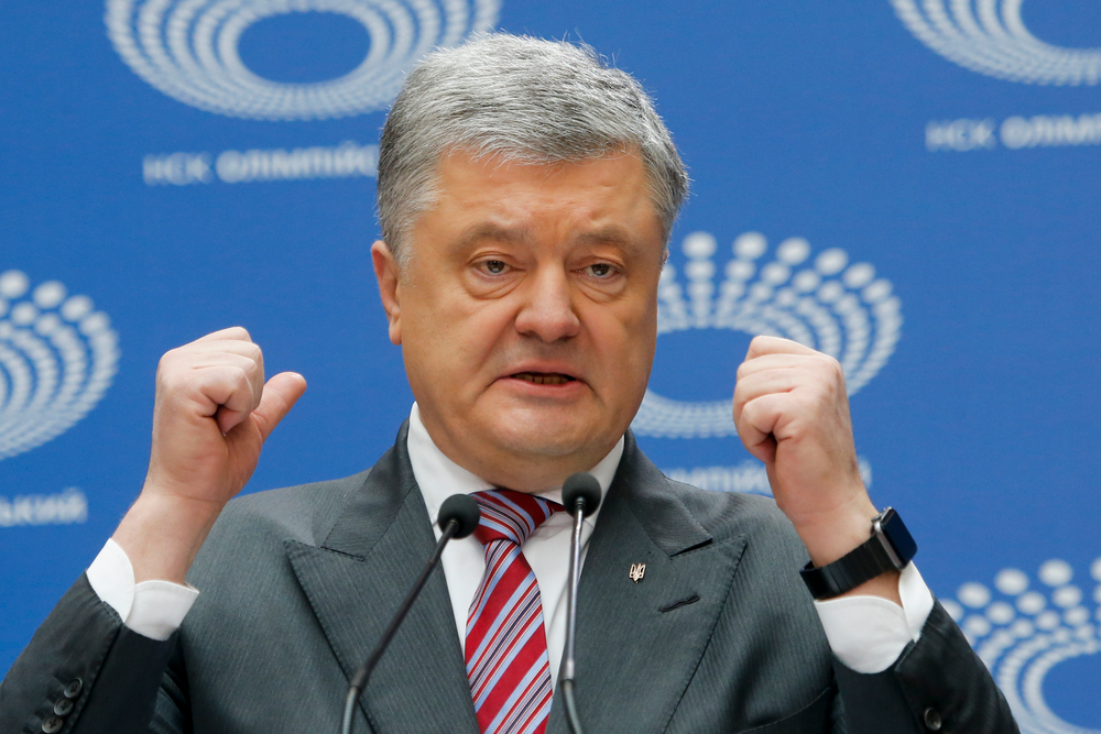 Ukrainian President Petro Poroshenko gestures while answering to a journalist's question ahead of the presidential elections on April 21, at the Olympic stadium in Kiev, Ukraine, Sunday, April 14, 2019. (AP Photo/Efrem Lukatsky) Ukrainian President Petro Poroshenko gestures while answering to a journalist's question ahead of the presidential elections on April 21, at the Olympic stadium in Kiev, Ukraine, Sunday, April 14, 2019. (AP Photo/Efrem Lukatsky)