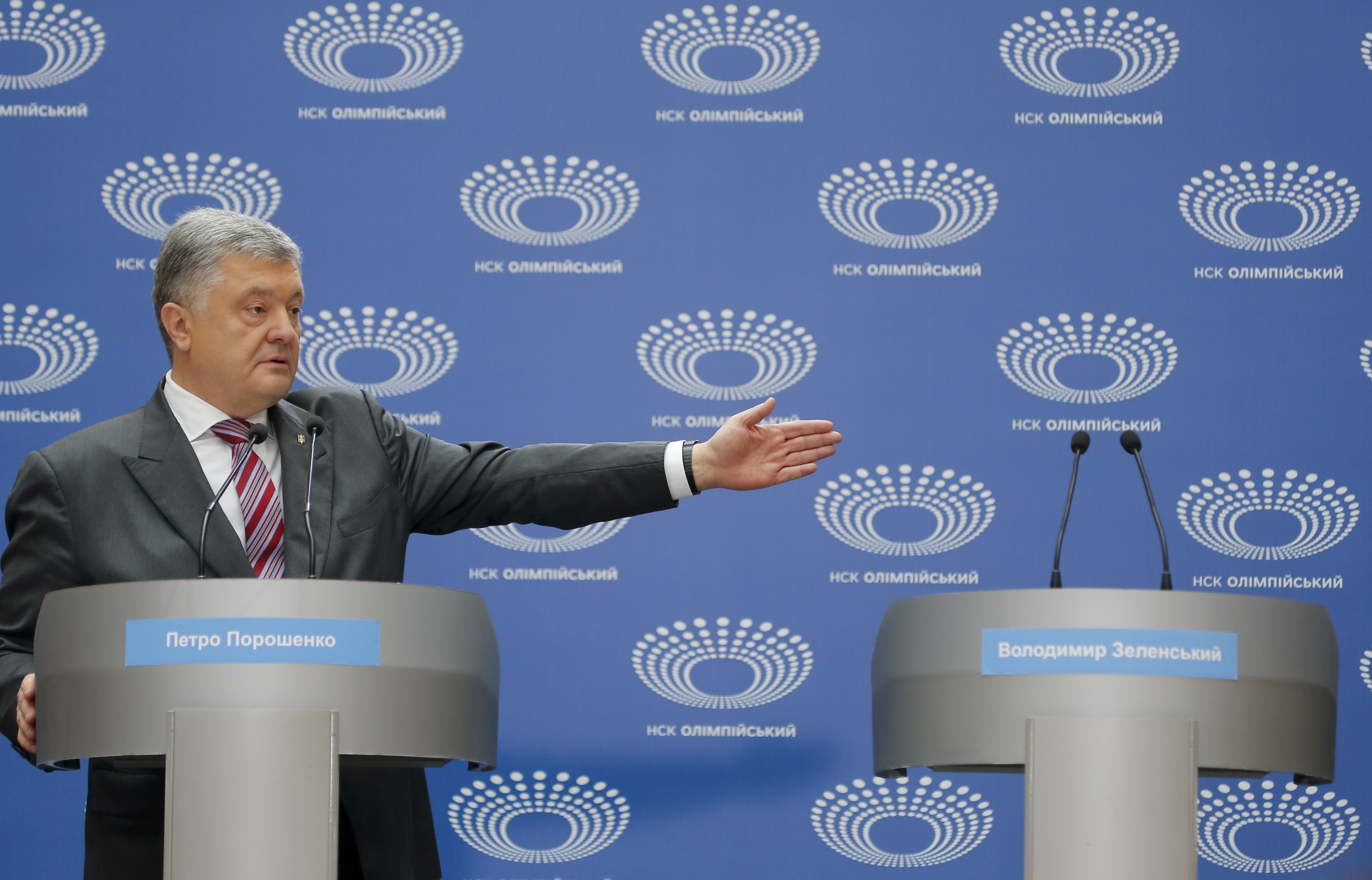 Ukrainian President Petro Poroshenko gestures as he answers to a journalist's question ahead of the presidential elections on April 21, at the Olympic stadium in Kiev, Ukraine, Sunday, April 14, 2019. The event Sunday was the latest unusual scene in the fight between Poroshenko and Zelenskiy, the comedian whom polls show holding a commanding lead. (AP Photo/Efrem Lukatsky) Ukrainian President Petro Poroshenko gestures as he answers to a journalist's question ahead of the presidential elections on April 21, at the Olympic stadium in Kiev, Ukraine, Sunday, April 14, 2019. The event Sunday was the latest unusual scene in the fight between Poroshenko and Zelenskiy, the comedian whom polls show holding a commanding lead. (AP Photo/Efrem Lukatsky)