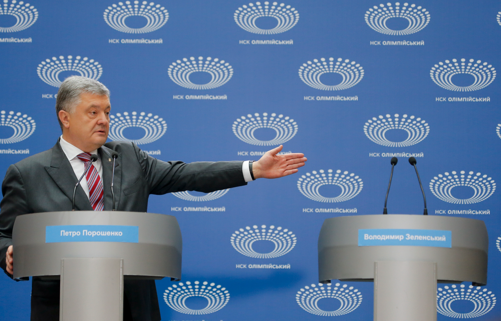 Ukrainian President Petro Poroshenko gestures as he answers to a journalist's question ahead of the presidential elections on April 21, at the Olympic stadium in Kiev, Ukraine, Sunday, April 14, 2019. The event Sunday was the latest unusual scene in the fight between Poroshenko and Zelenskiy, the comedian whom polls show holding a commanding lead. (AP Photo/Efrem Lukatsky) Ukrainian President Petro Poroshenko gestures as he answers to a journalist's question ahead of the presidential elections on April 21, at the Olympic stadium in Kiev, Ukraine, Sunday, April 14, 2019. The event Sunday was the latest unusual scene in the fight between Poroshenko and Zelenskiy, the comedian whom polls show holding a commanding lead. (AP Photo/Efrem Lukatsky)