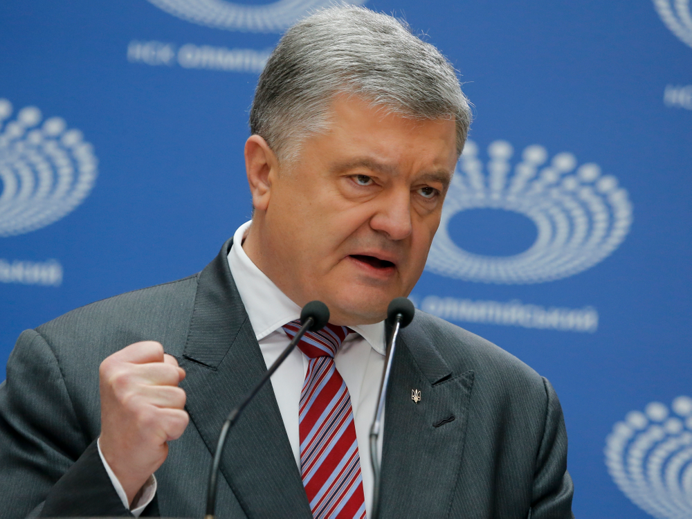 Ukrainian President Petro Poroshenko gestures as he answers to a journalist's question ahead of the presidential elections on April 21, at the Olympic stadium in Kiev, Ukraine, Sunday, April 14, 2019. (AP Photo/Efrem Lukatsky) Ukrainian President Petro Poroshenko gestures as he answers to a journalist's question ahead of the presidential elections on April 21, at the Olympic stadium in Kiev, Ukraine, Sunday, April 14, 2019. (AP Photo/Efrem Lukatsky)