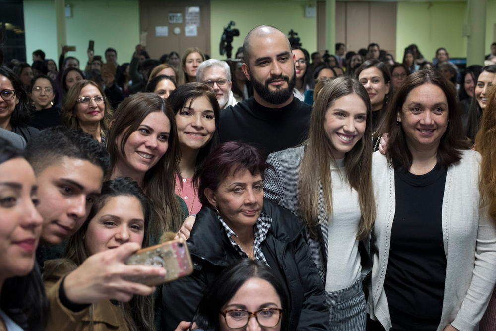 Fabiana Rosales, second from right, wife of Venezuelan opposition leader Juan Guaido, and Aminta Perez, third from right, mother of Venezuelan police Officer Oscar Perez, pose for a photo with members of the Venezuelan community in New York after attending Mass at St. Teresa's Church on the Lower East Side of Manhattan, Tuesday, March 26, 2019. Rosales is emerging as a prominent figure in Guaido's campaign to bring change in the crisis-wracked country. (AP Photo/Mary Altaffer) Fabiana Rosales, second from right, wife of Venezuelan opposition leader Juan Guaido, and Aminta Perez, third from right, mother of Venezuelan police Officer Oscar Perez, pose for a photo with members of the Venezuelan community in New York after attending Mass at St. Teresa's Church on the Lower East Side of Manhattan, Tuesday, March 26, 2019. Rosales is emerging as a prominent figure in Guaido's campaign to bring change in the crisis-wracked country. (AP Photo/Mary Altaffer)