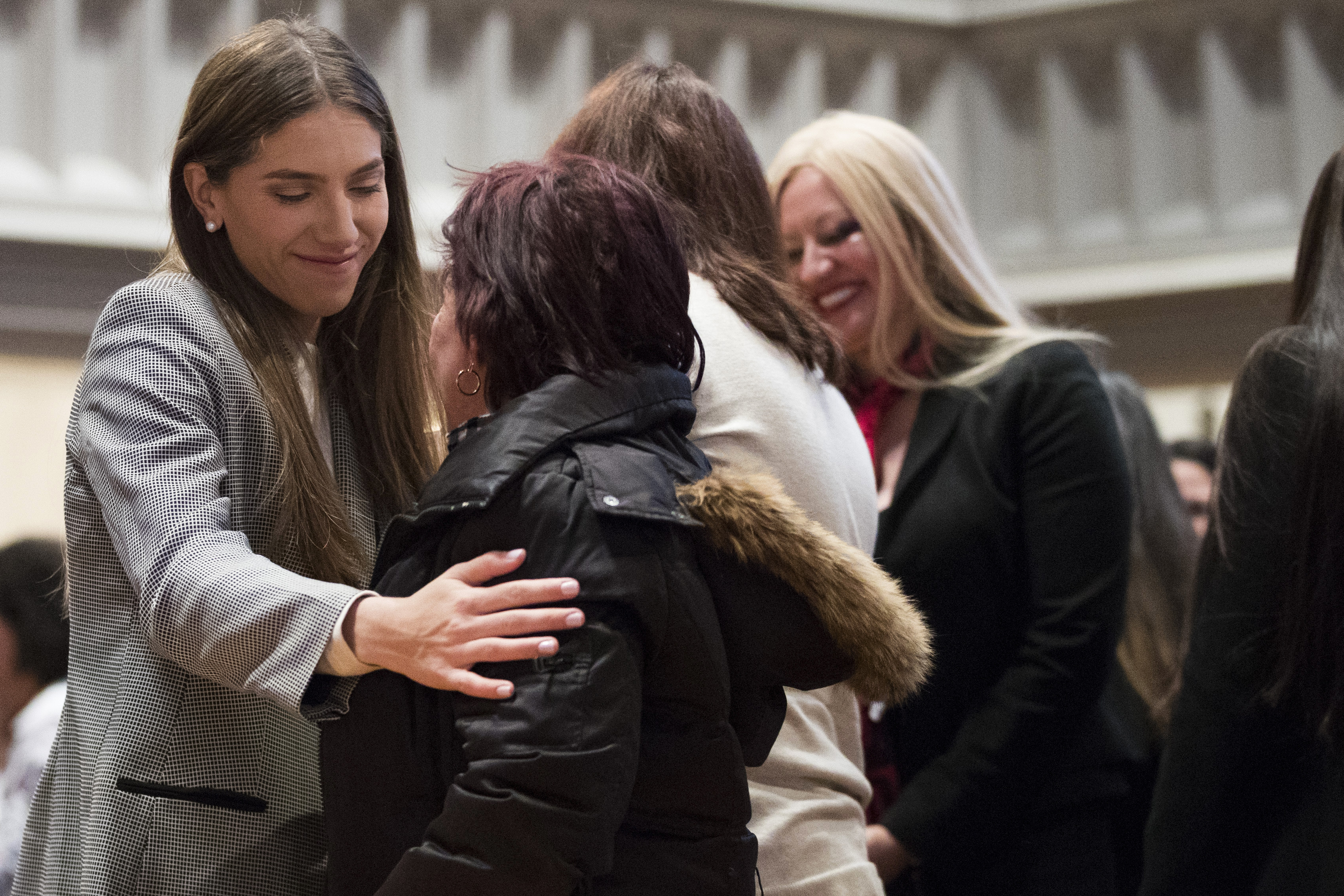 Fabiana Rosales, left, wife of Venezuelan opposition leader Juan Guaido, hugs Aminta Perez, mother of Venezuelan police Officer Oscar Perez, while celebrating Mass at St. Teresa's Church on the Lower East Side of Manhattan, Tuesday, March 26, 2019, in New York. Rosales is emerging as a prominent figure in Guaido's campaign to bring change in the crisis-wracked country. (AP Photo/Mary Altaffer) Fabiana Rosales, left, wife of Venezuelan opposition leader Juan Guaido, hugs Aminta Perez, mother of Venezuelan police Officer Oscar Perez, while celebrating Mass at St. Teresa's Church on the Lower East Side of Manhattan, Tuesday, March 26, 2019, in New York. Rosales is emerging as a prominent figure in Guaido's campaign to bring change in the crisis-wracked country. (AP Photo/Mary Altaffer)